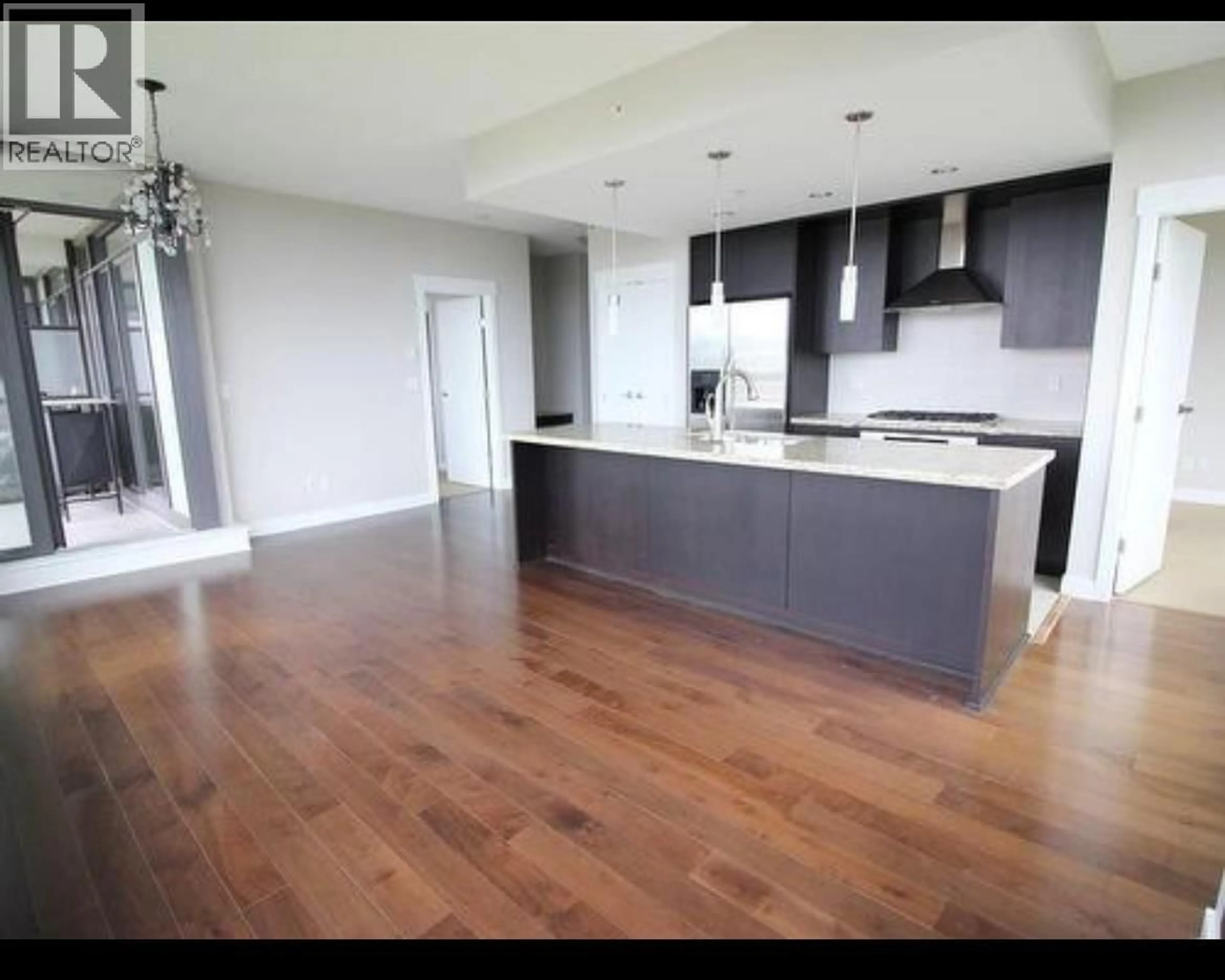 Open concept kitchen, wood/laminate floor for 2902 - 7088 18TH AVENUE, Burnaby British Columbia V3N0A2