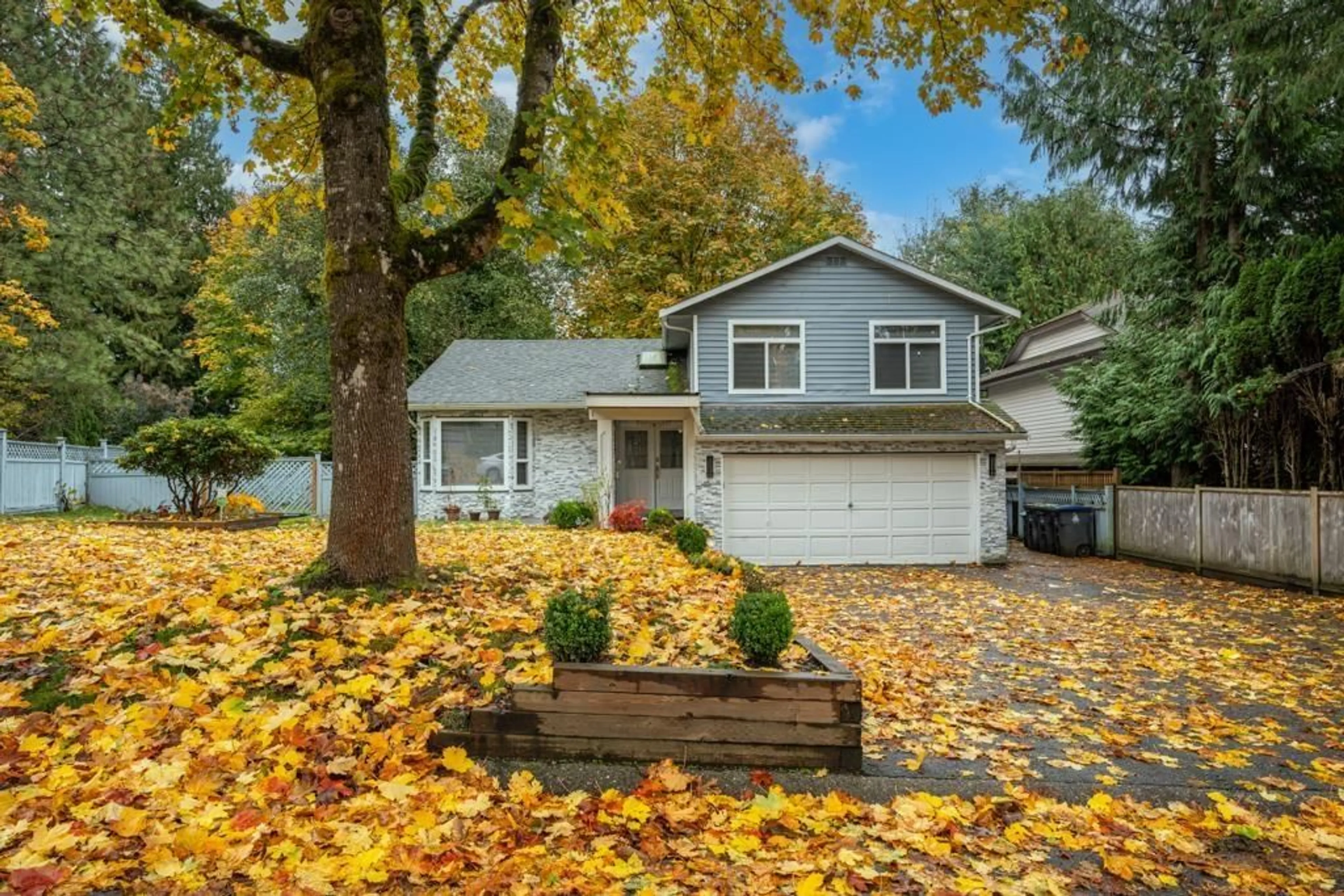 Home with vinyl exterior material, street for 14346 68B, Surrey British Columbia V3W8X1