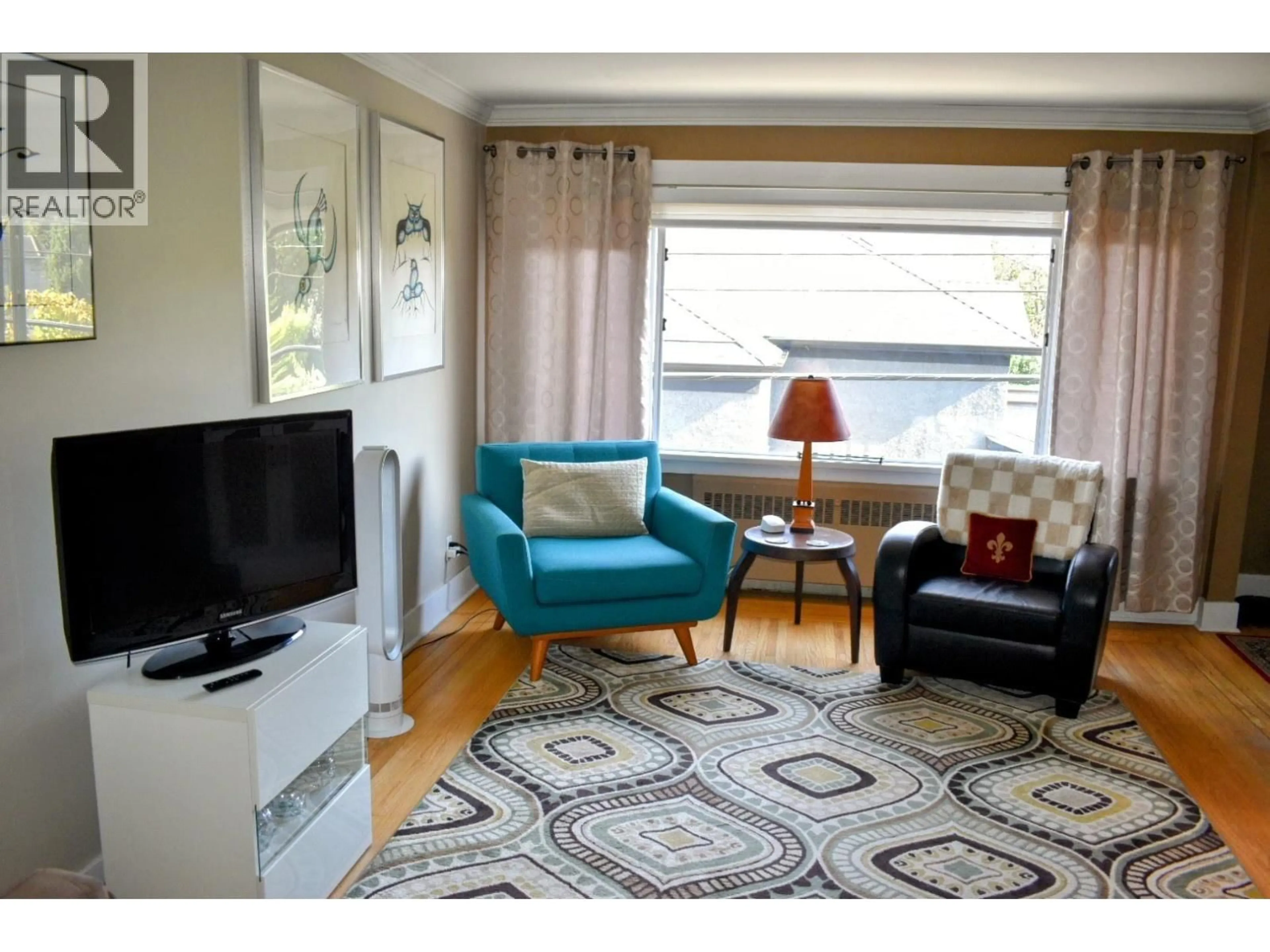 Living room with furniture, unknown for 305 - 3530 CAMBIE STREET, Vancouver British Columbia V5Z2X1