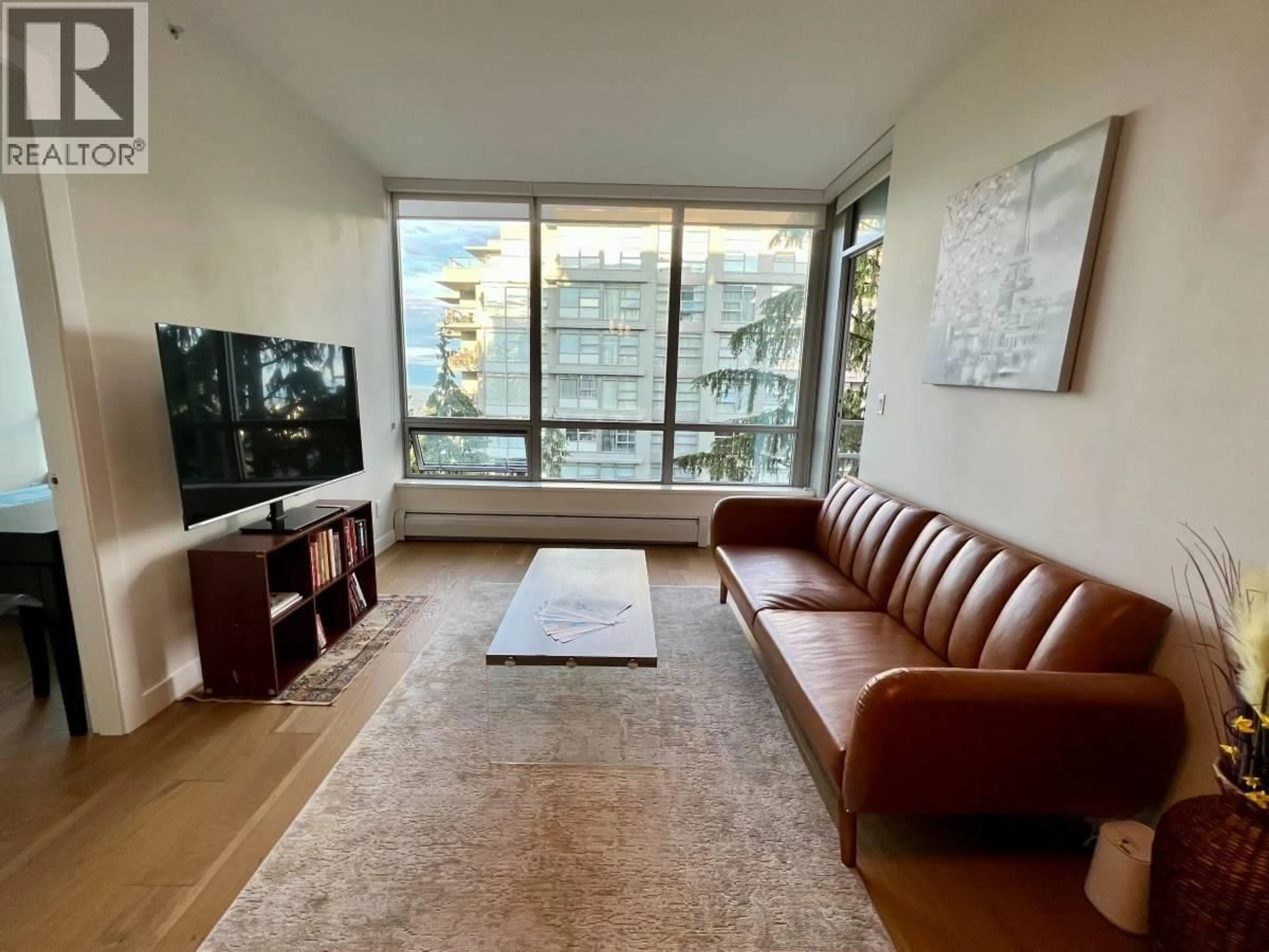 Living room with furniture, unknown for 1005 - 9080 UNIVERSITY CRESCENT, Burnaby British Columbia V5A0B7