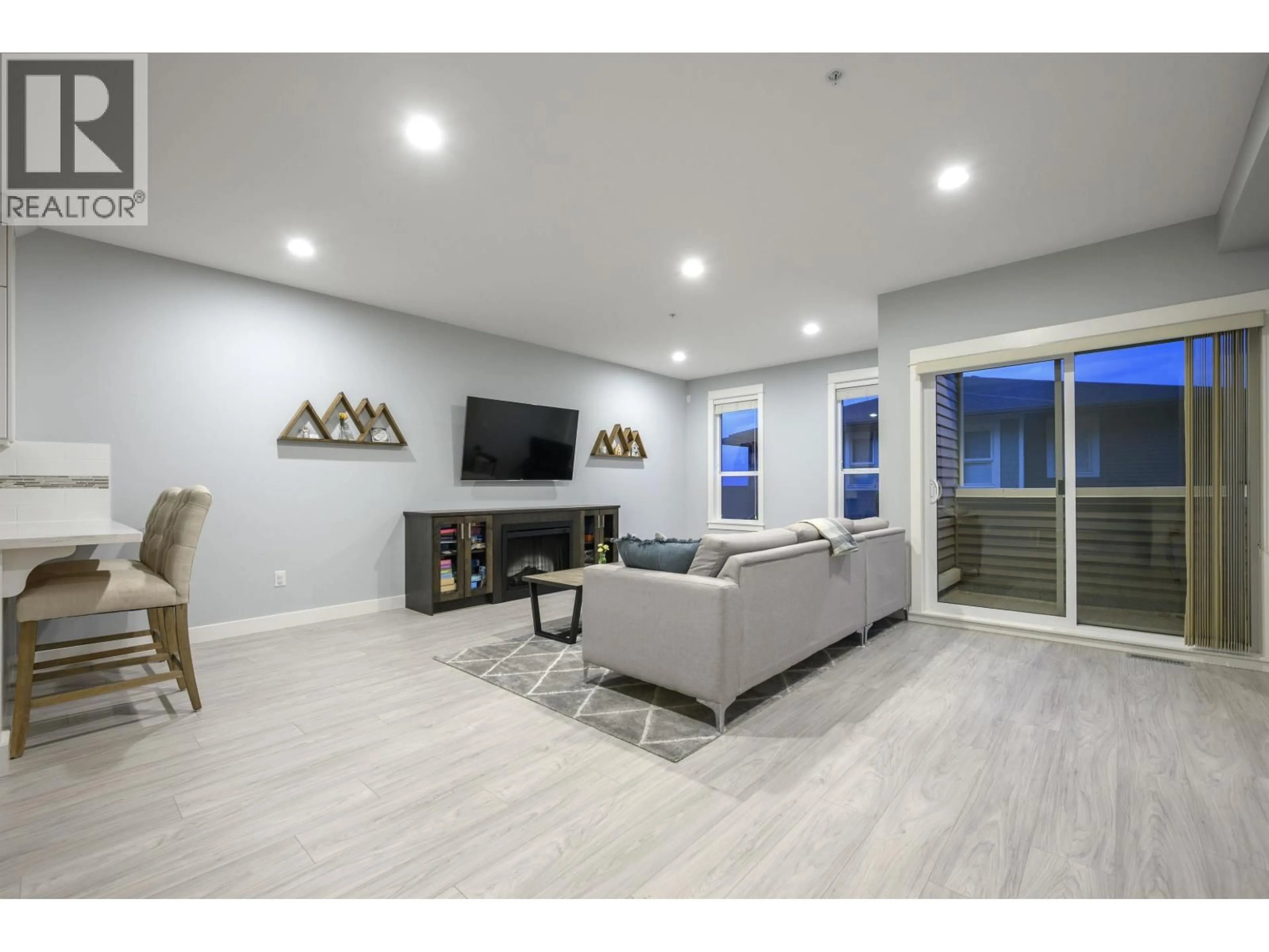 Living room with furniture, wood/laminate floor for 53 - 10480 248 STREET, Maple Ridge British Columbia V2W0J4
