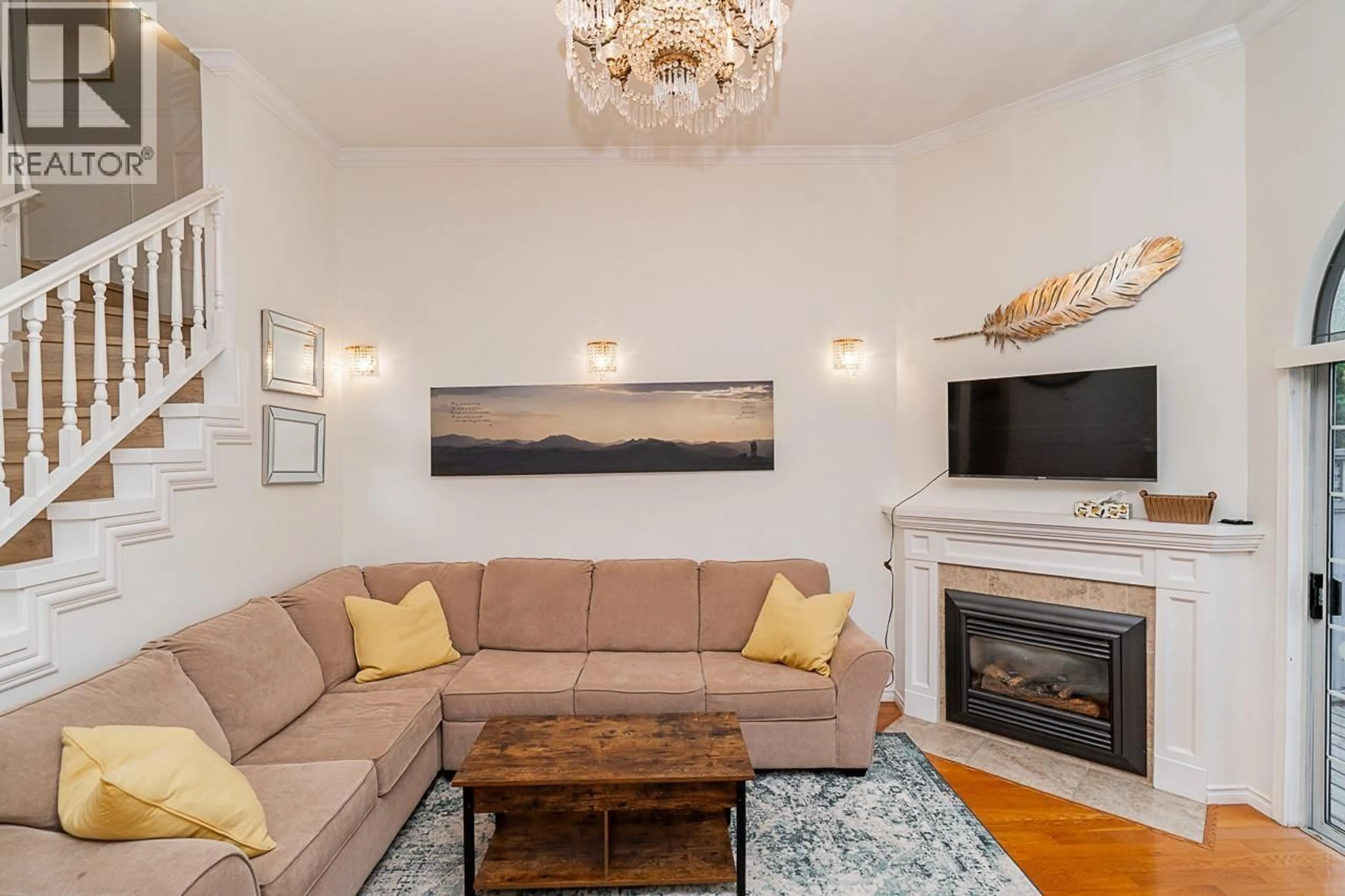 Living room with furniture, wood/laminate floor for 109 - 216 6TH STREET, North Vancouver British Columbia V7L1P5