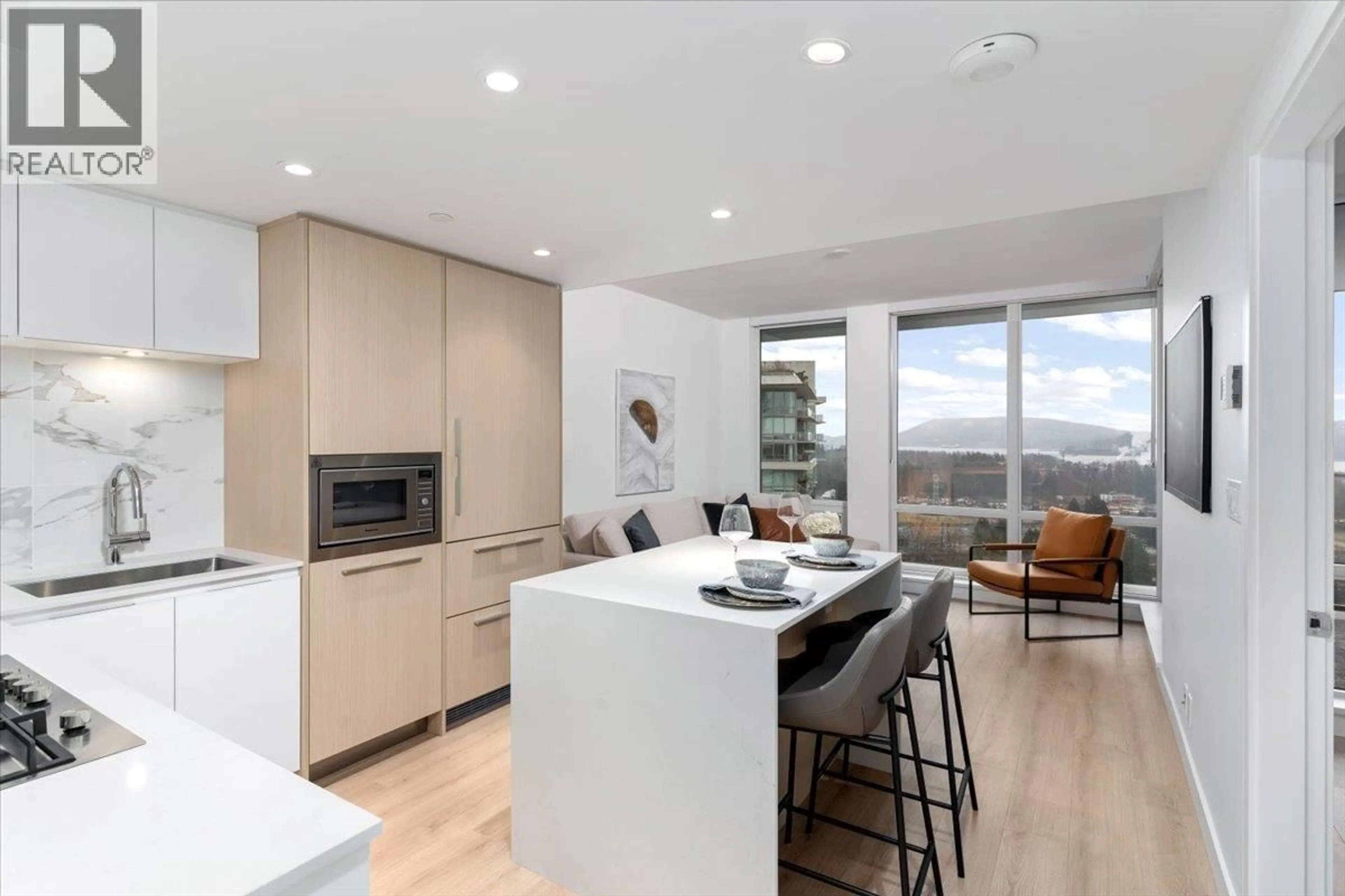 Open concept kitchen, wood/laminate floor for 2205 - 1500 FERN STREET, North Vancouver British Columbia V7J0E6