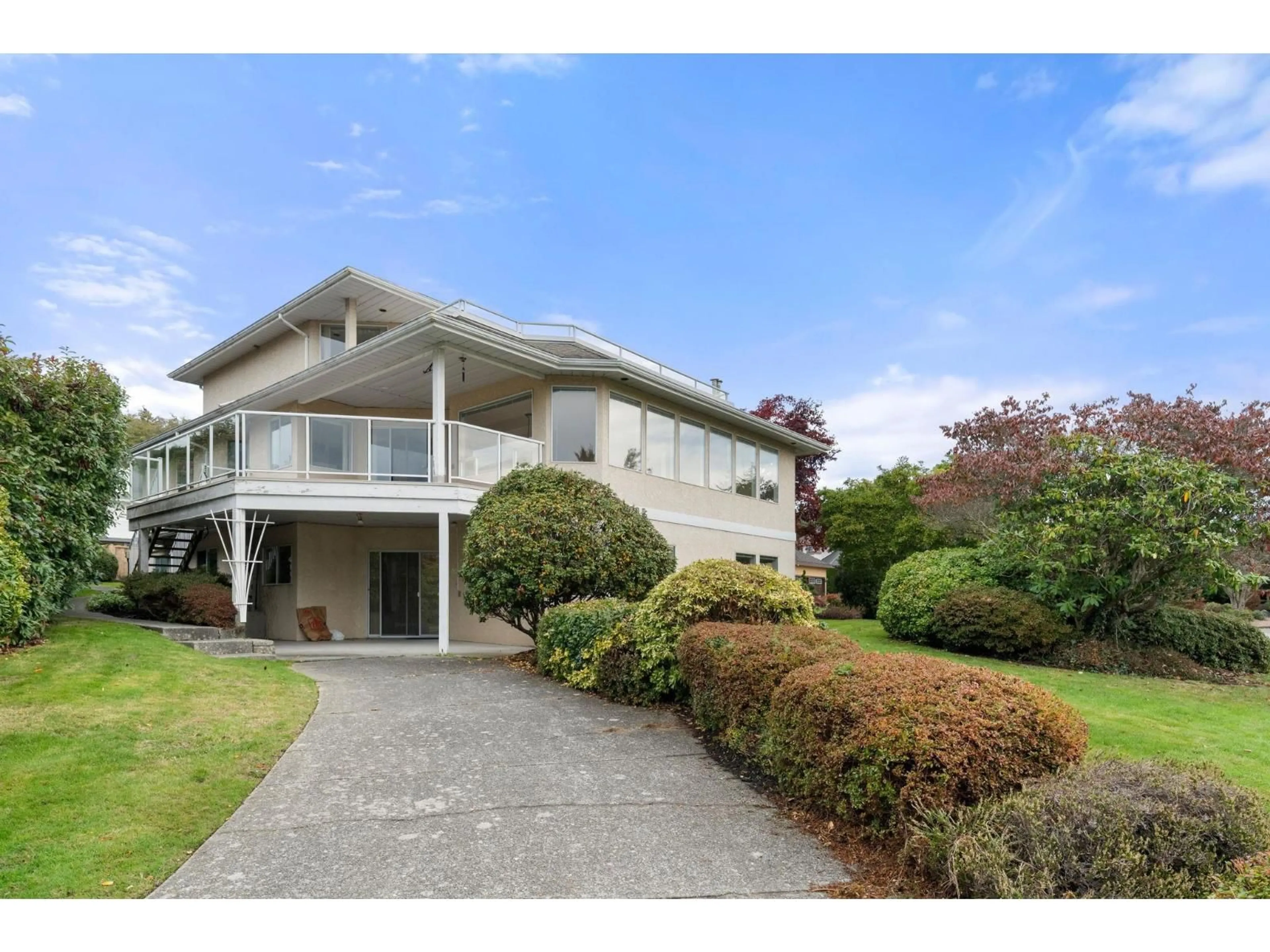 A pic from outside/outdoor area/front of a property/back of a property/a pic from drone, unknown for 13395 14, Surrey British Columbia V4A9B7