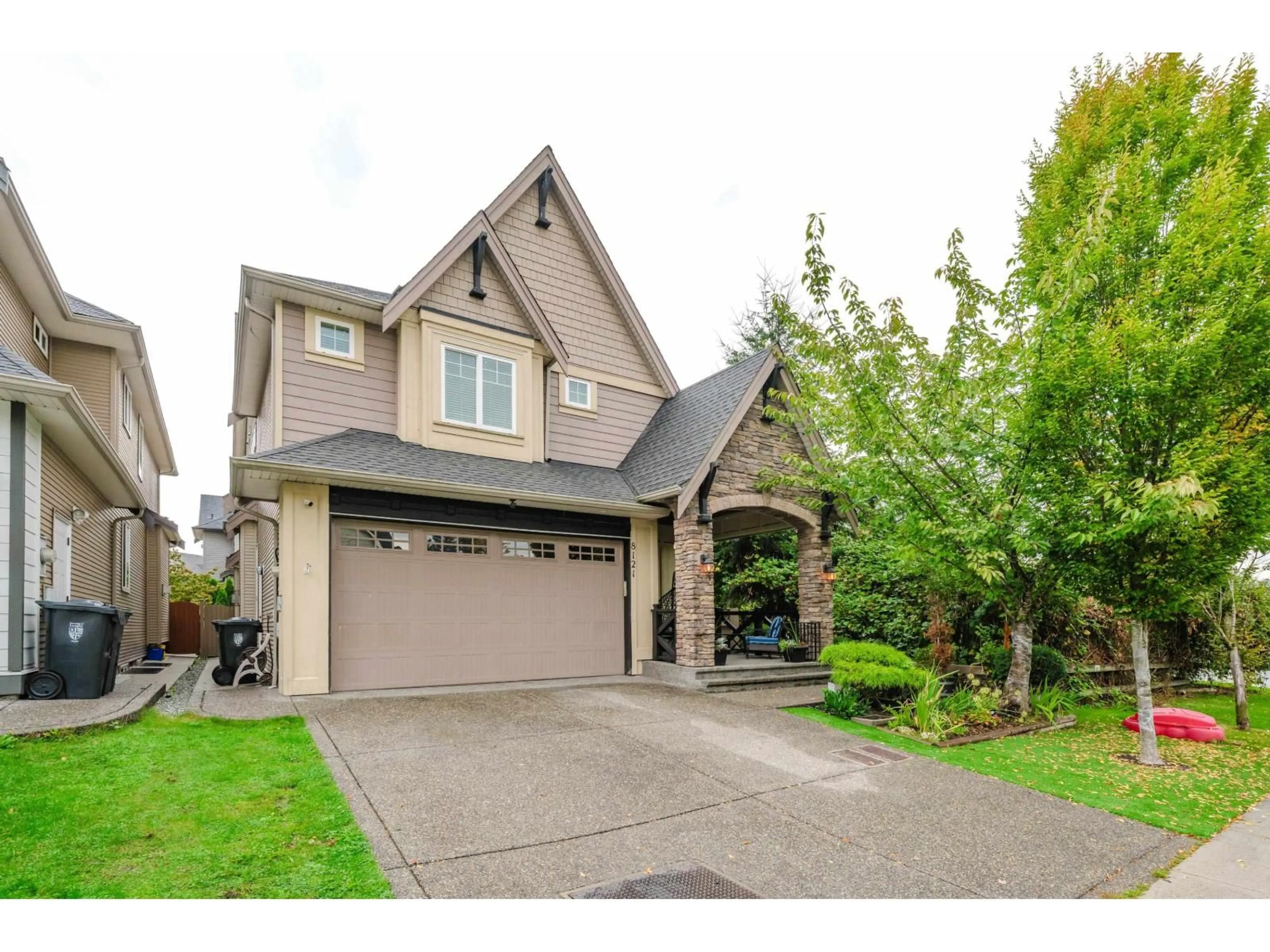 Home with brick exterior material, street for 8121 210A, Langley British Columbia V2Y0K2