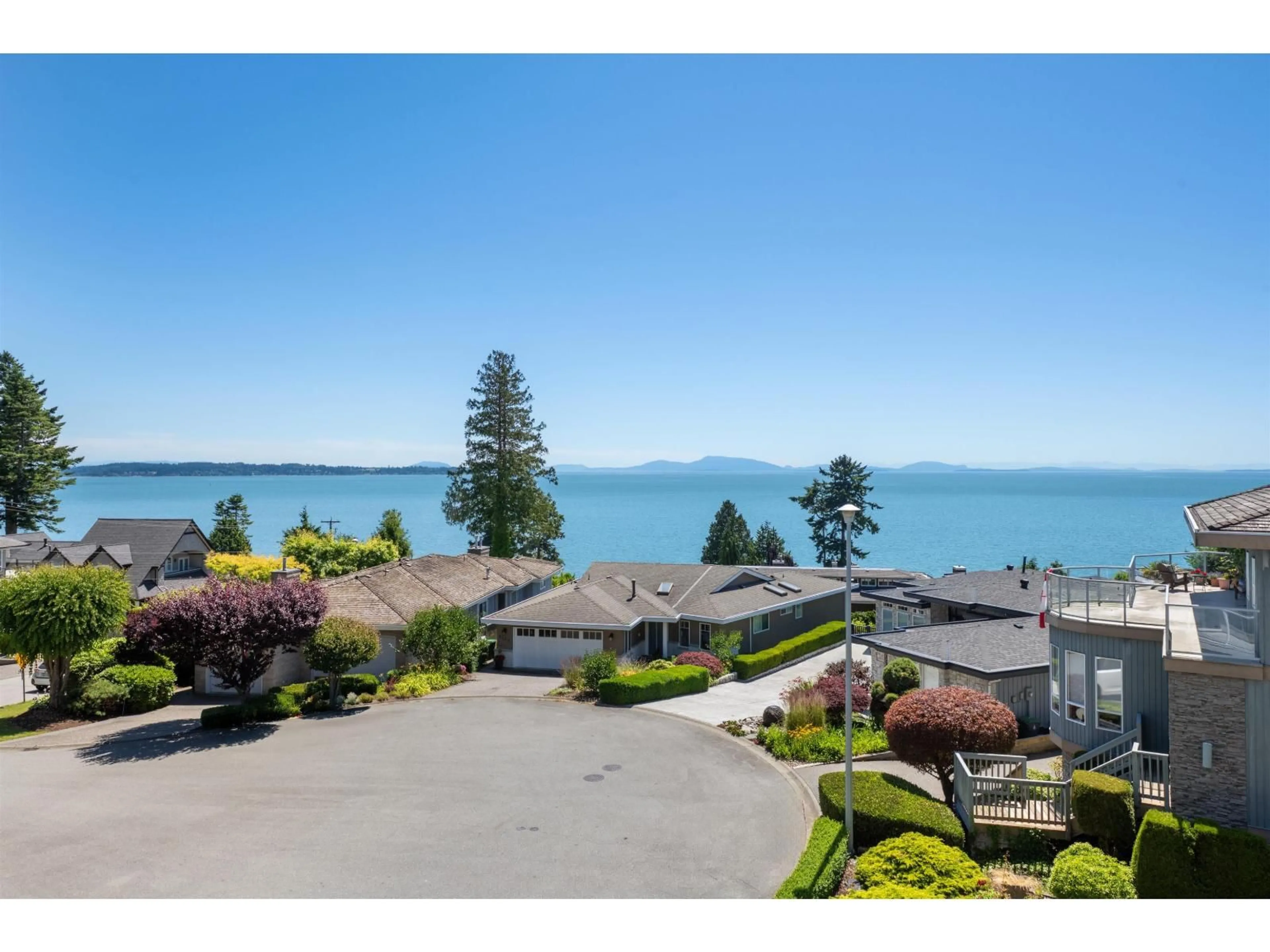 A pic from outside/outdoor area/front of a property/back of a property/a pic from drone, water/lake/river/ocean view for 1343 132B, Surrey British Columbia V4A4C2