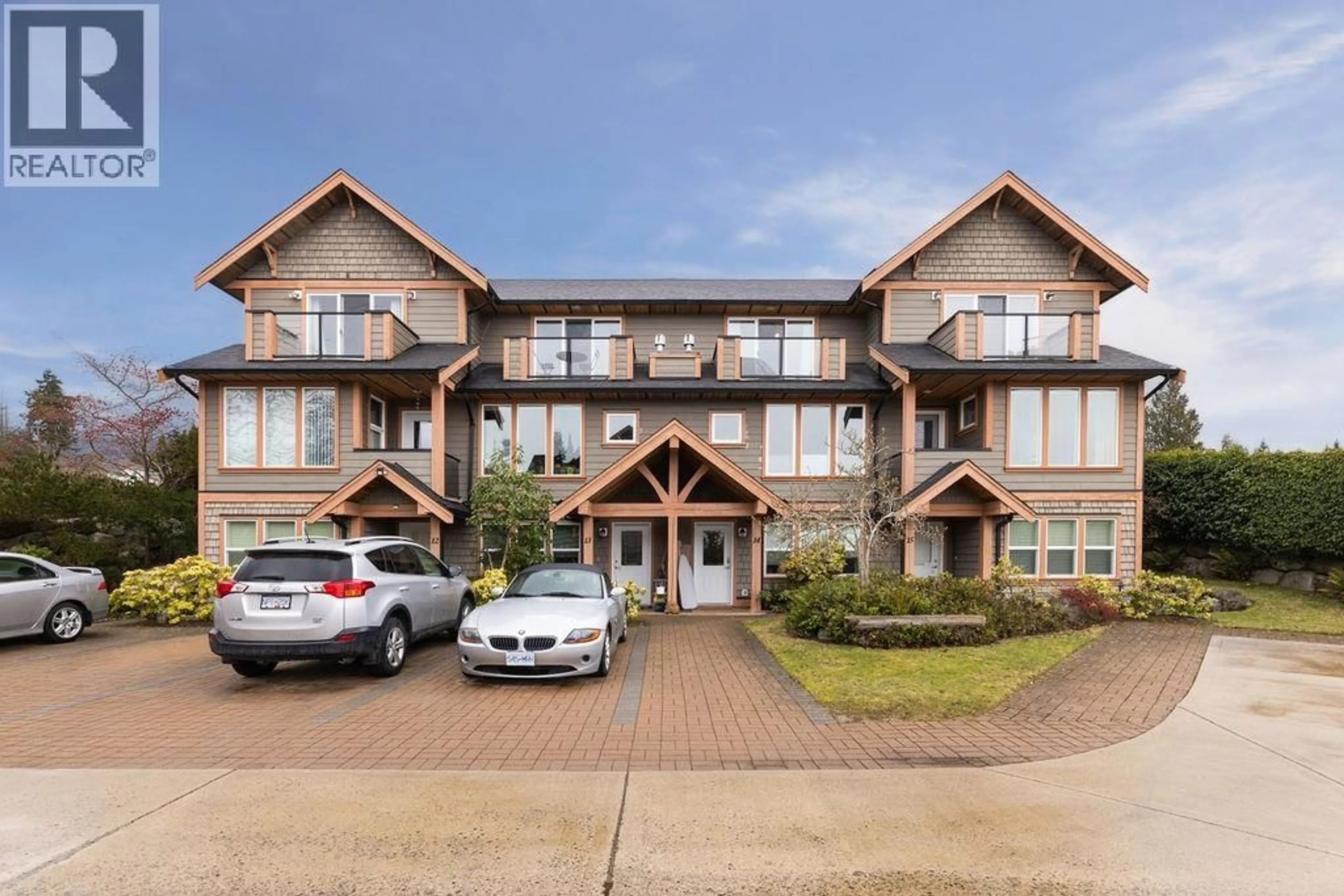 A pic from outside/outdoor area/front of a property/back of a property/a pic from drone, building for 14 - 728 GIBSONS WAY, Gibsons British Columbia V0N1V9