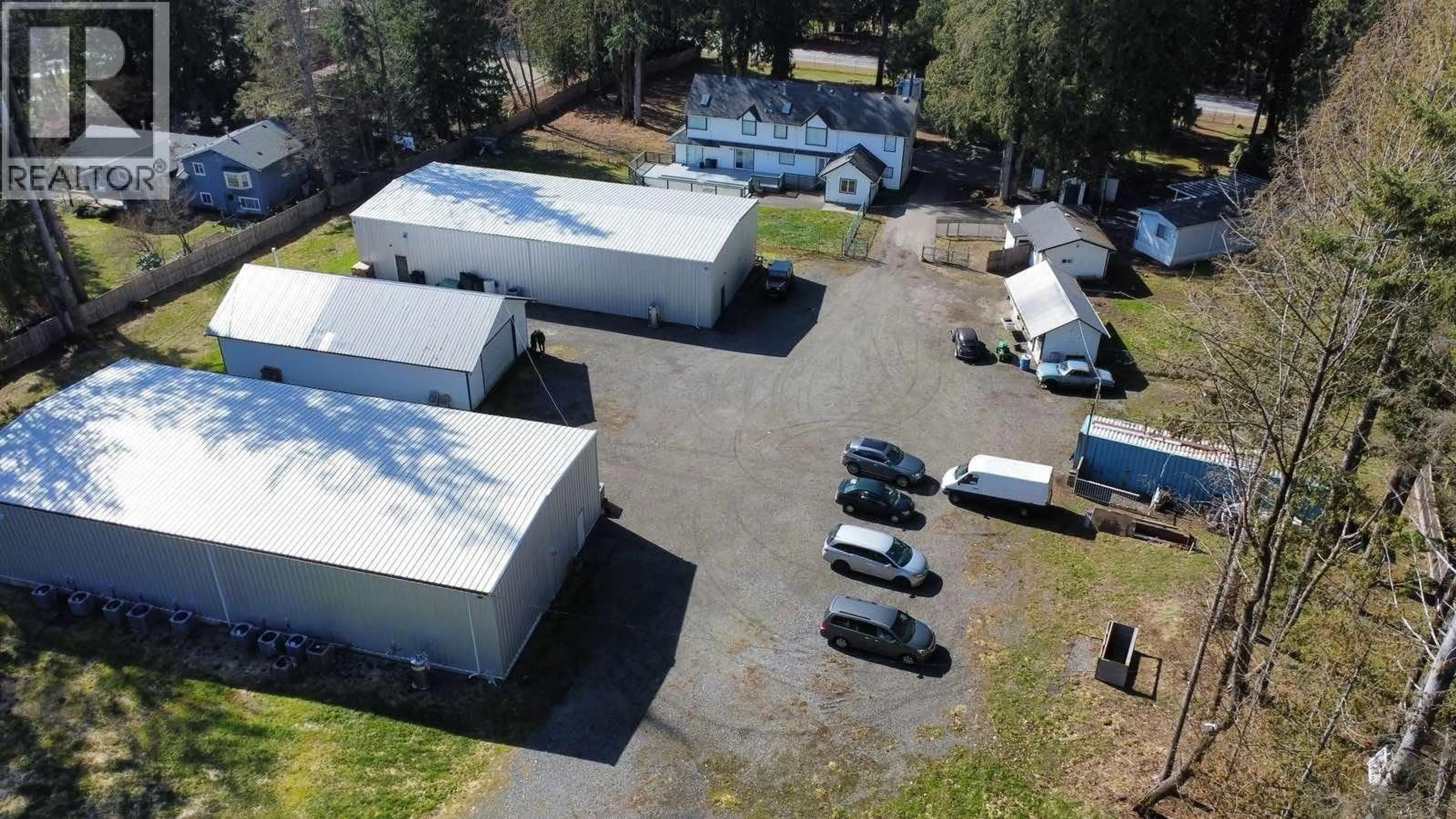 A pic from outside/outdoor area/front of a property/back of a property/a pic from drone, building for 11276 272 STREET, Maple Ridge British Columbia V2W1Y6