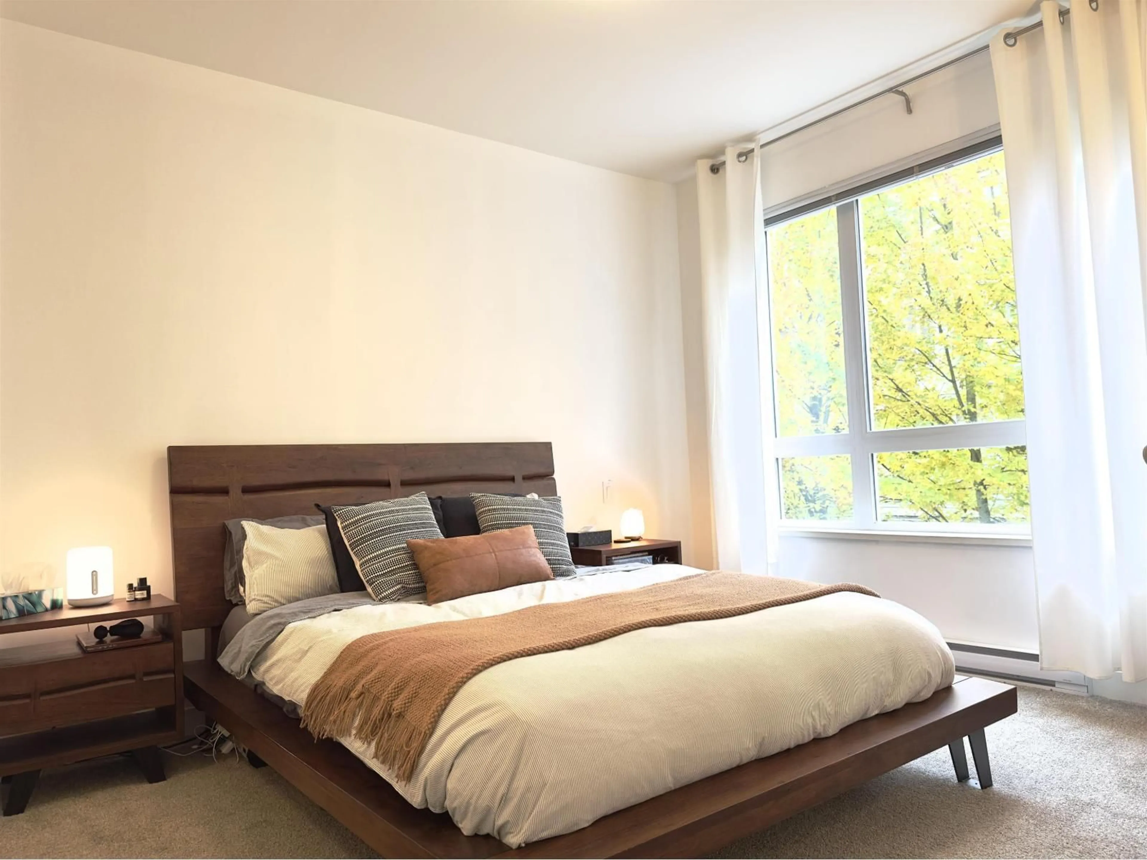 Bedroom with bed, wood/laminate floor for 116 - 13925 FRASER, Surrey British Columbia V3T4E6
