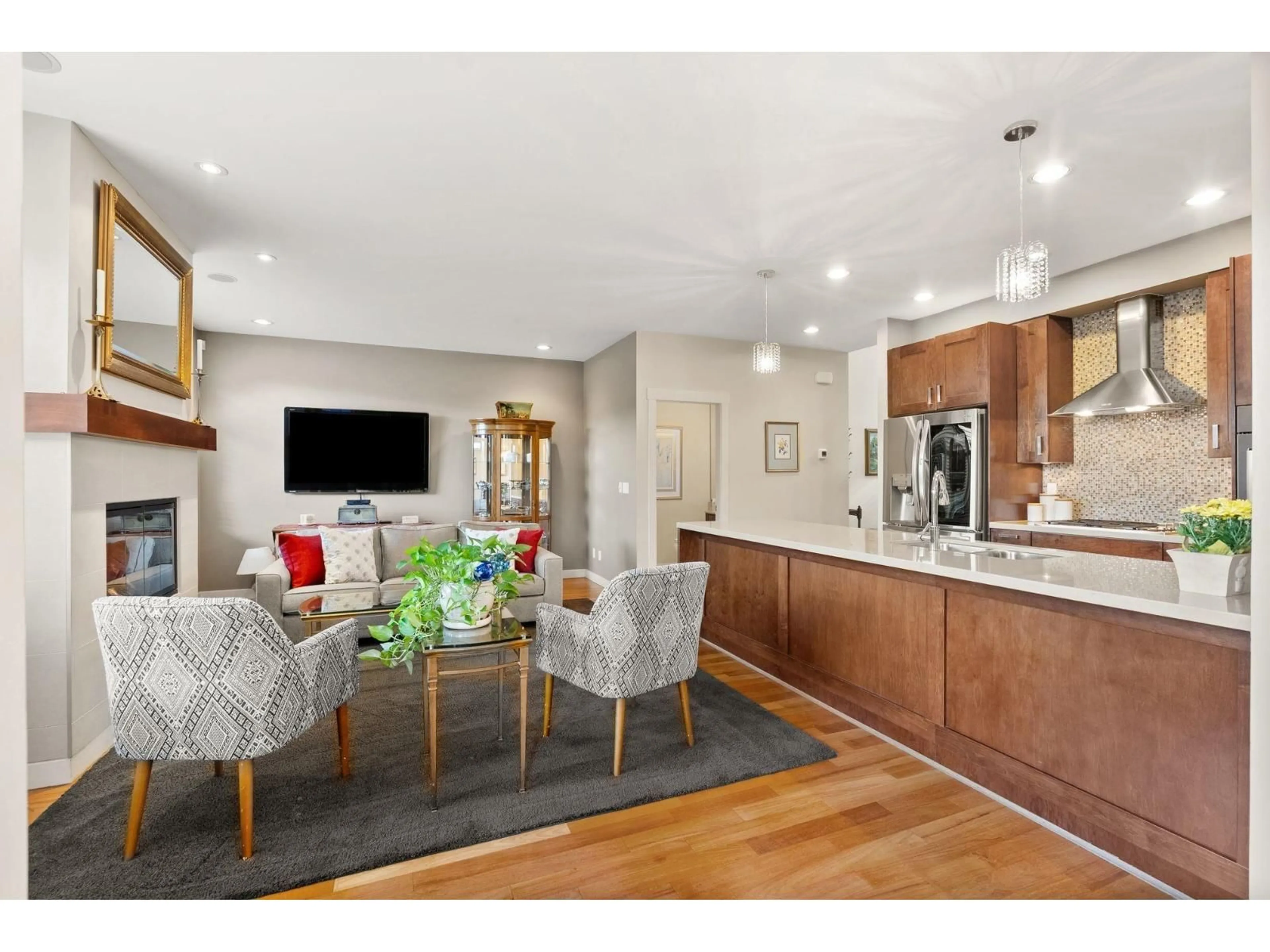 Open concept kitchen, wood/laminate floor for 57 - 2603 162, Surrey British Columbia V3Z2L4