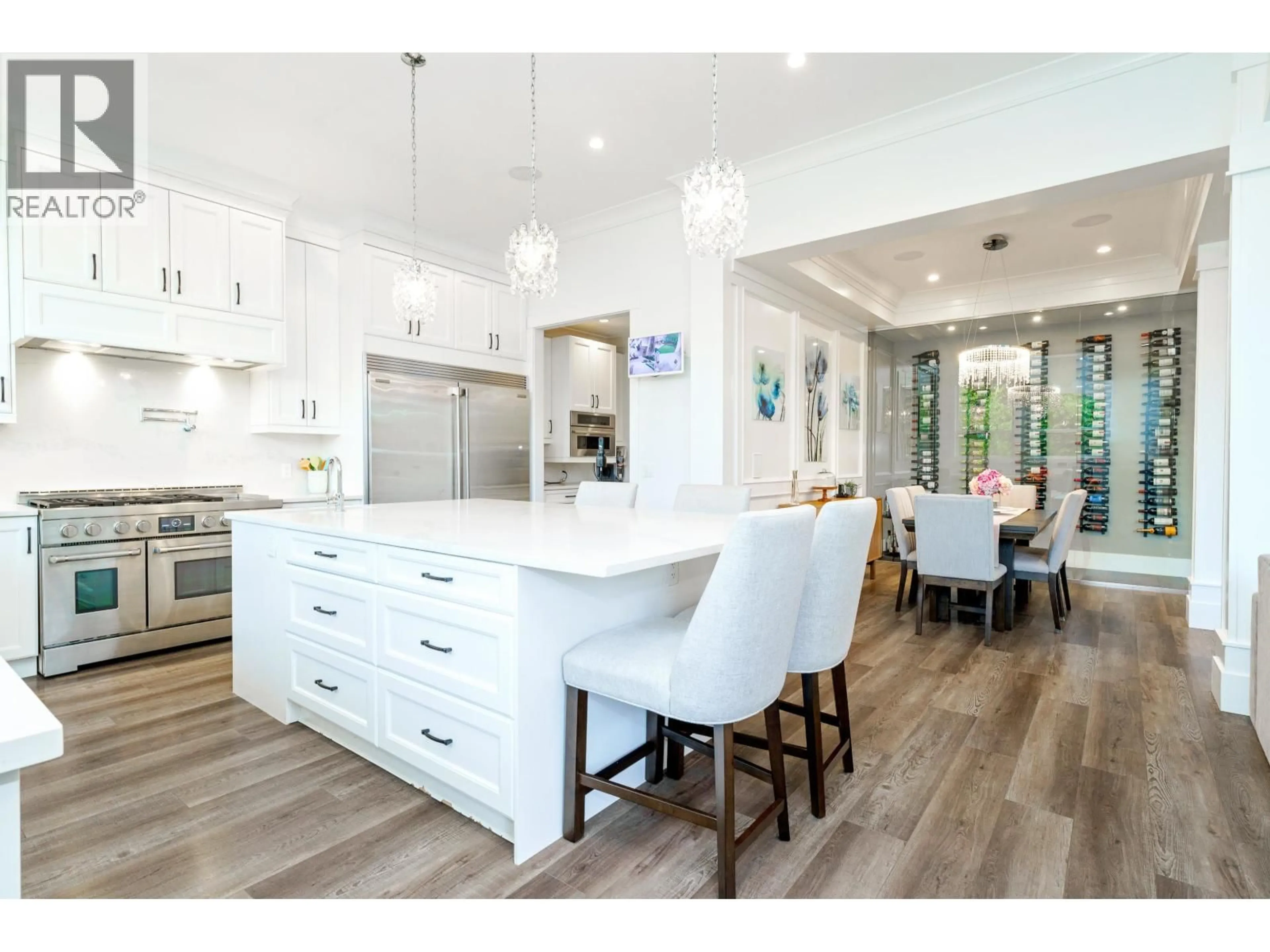 Open concept kitchen, wood/laminate floor for 23066 135 AVENUE, Maple Ridge British Columbia V4R0E6