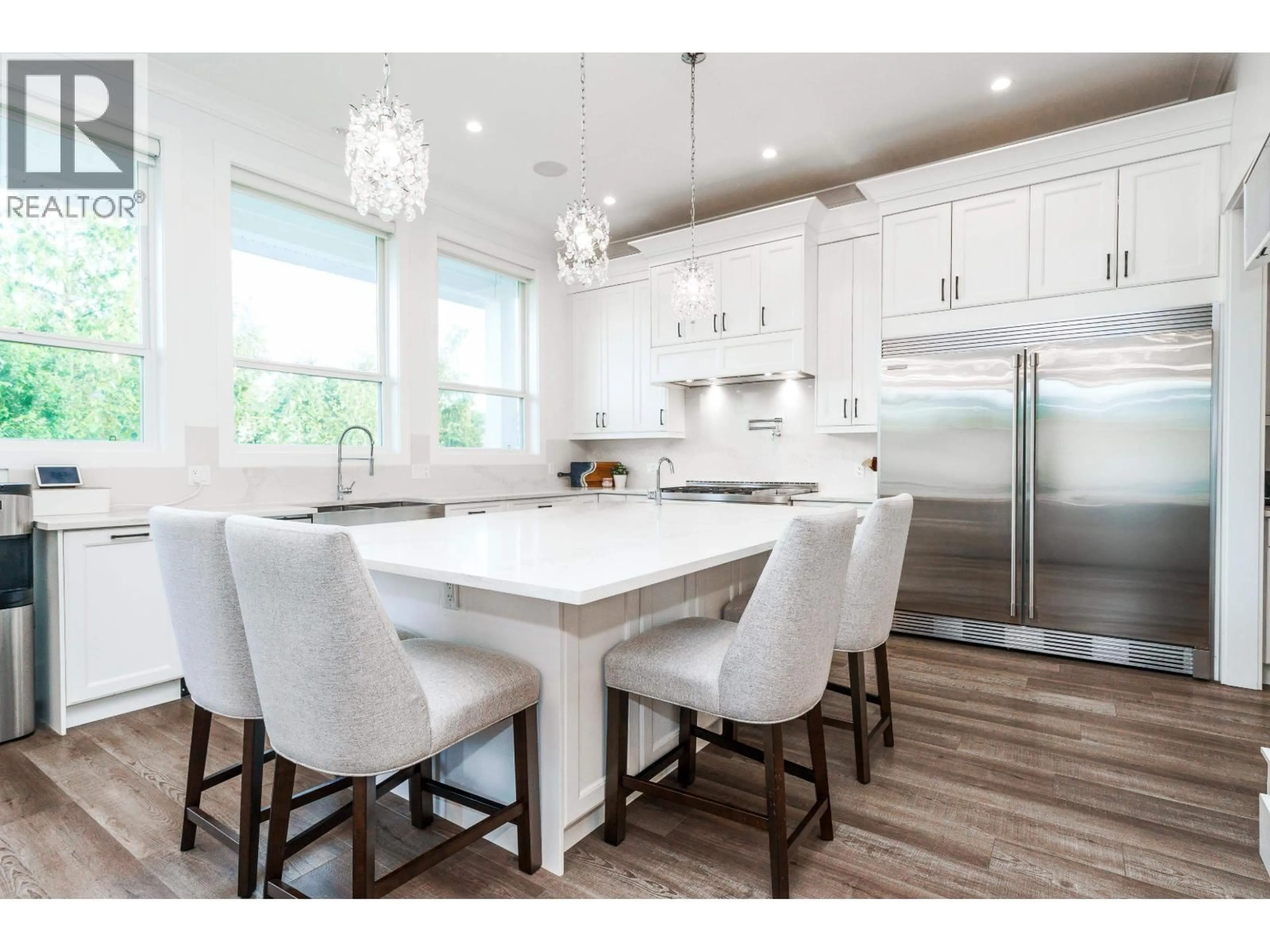 Open concept kitchen, wood/laminate floor for 23066 135 AVENUE, Maple Ridge British Columbia V4R0E6