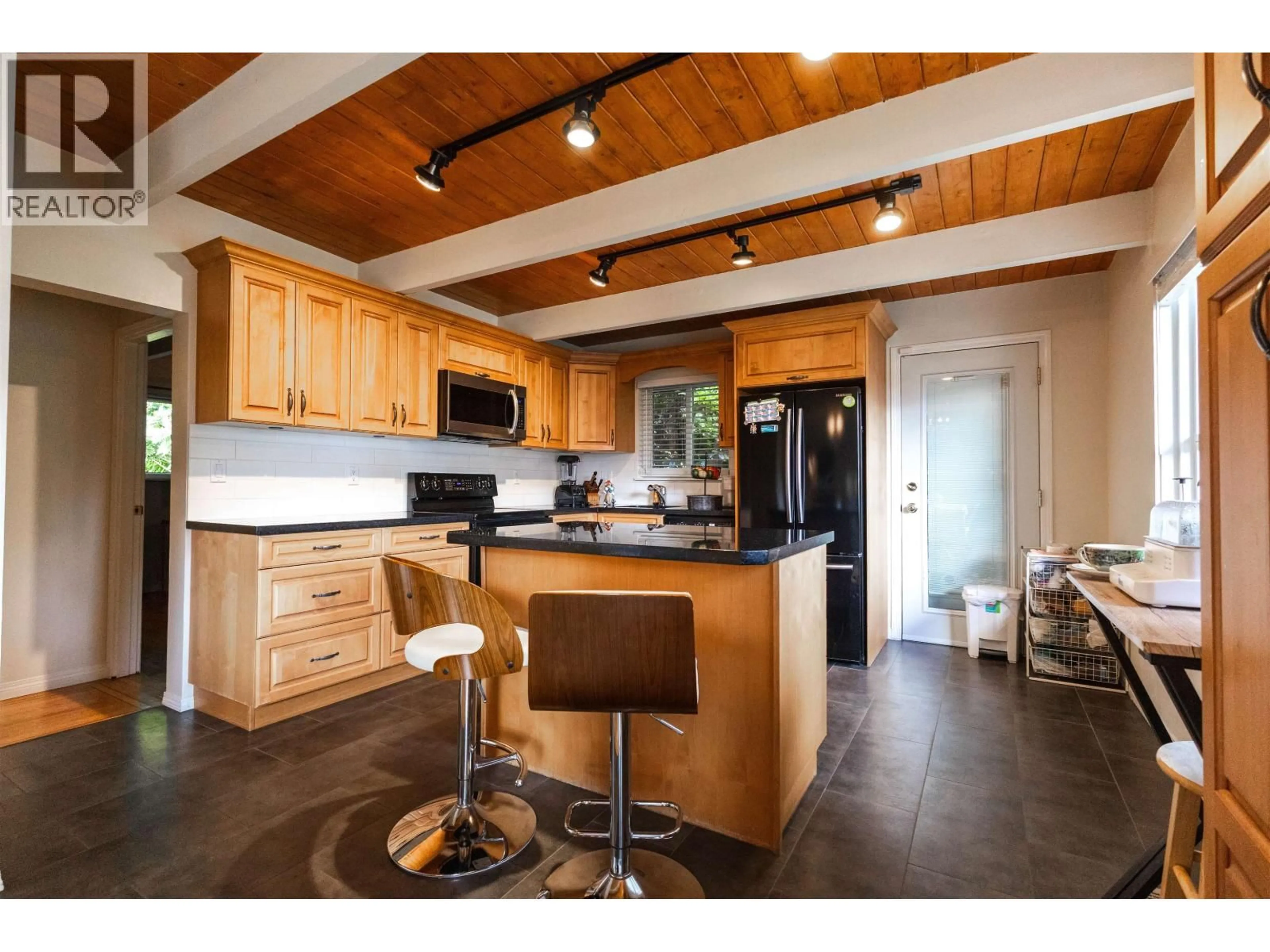 Open concept kitchen, wood/laminate floor for 3063 ROYAL AVENUE, North Vancouver British Columbia V7K1Y6