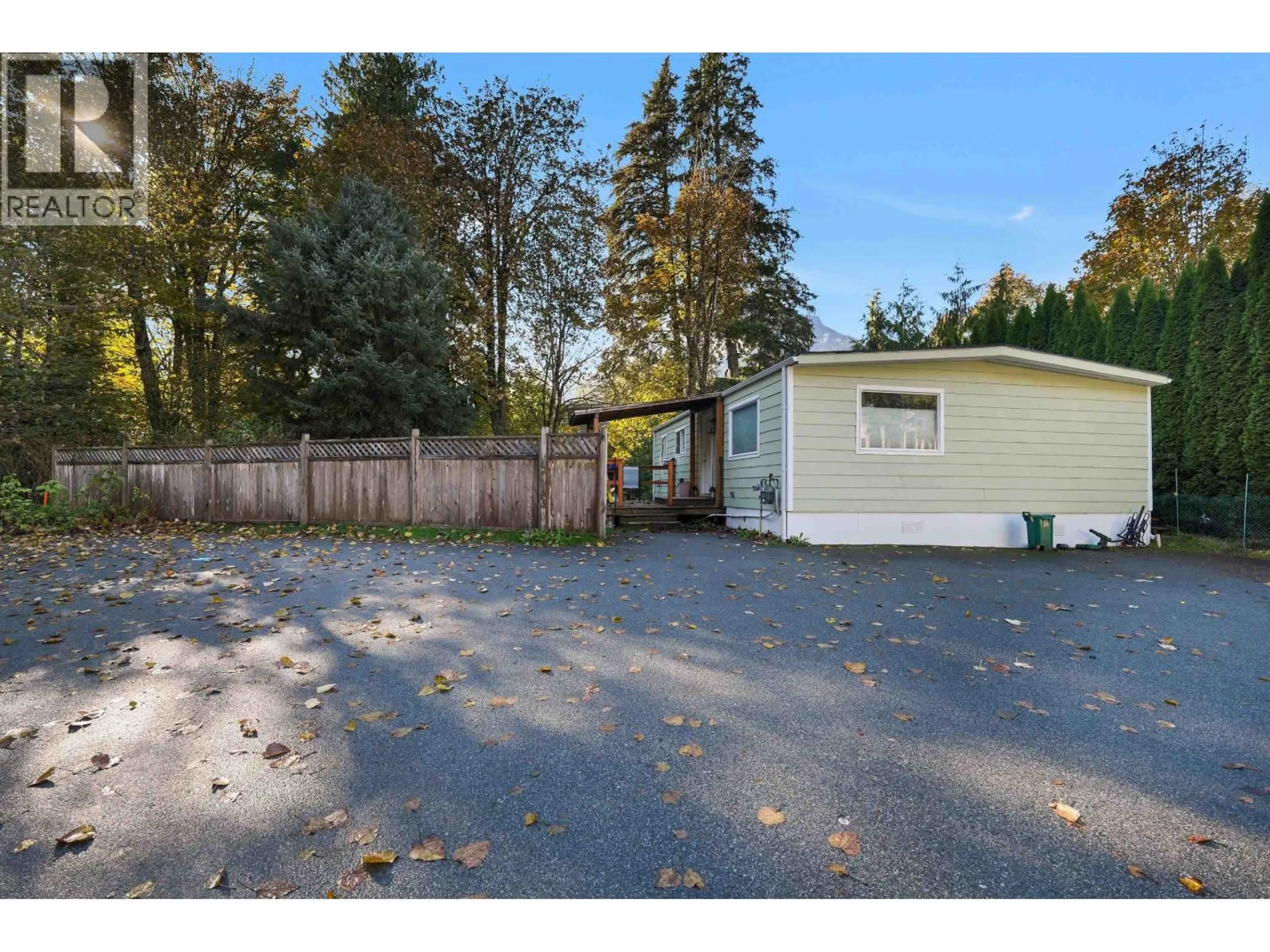 A pic from outside/outdoor area/front of a property/back of a property/a pic from drone, street for 8 - 39884 GOVERNMENT ROAD, Squamish British Columbia V8B0B1