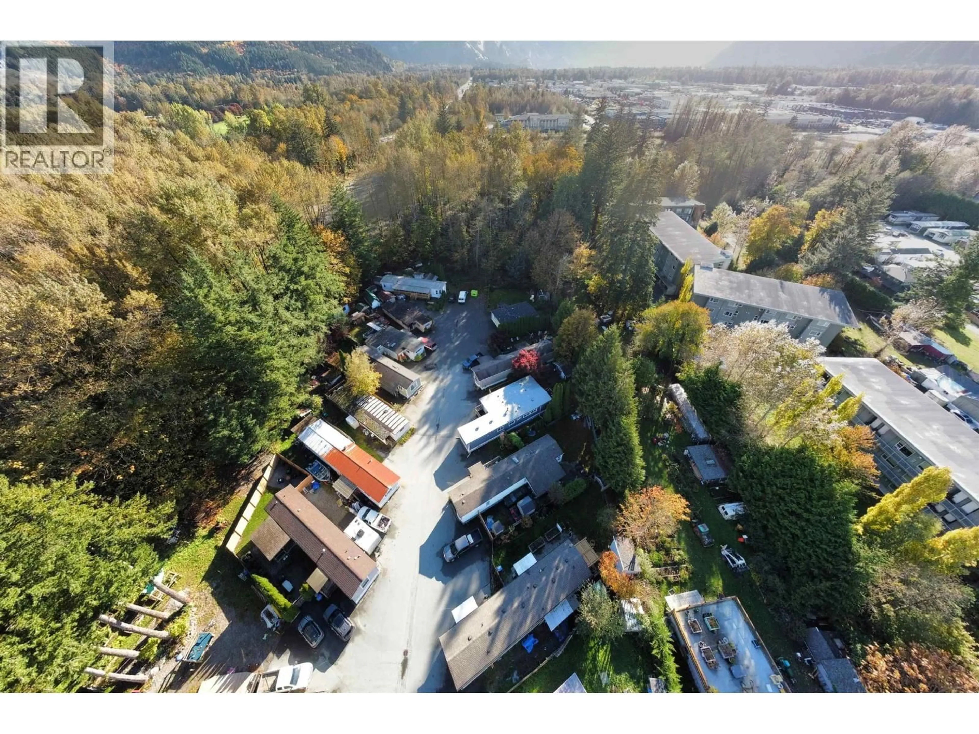 A pic from outside/outdoor area/front of a property/back of a property/a pic from drone, unknown for 8 - 39884 GOVERNMENT ROAD, Squamish British Columbia V8B0B1