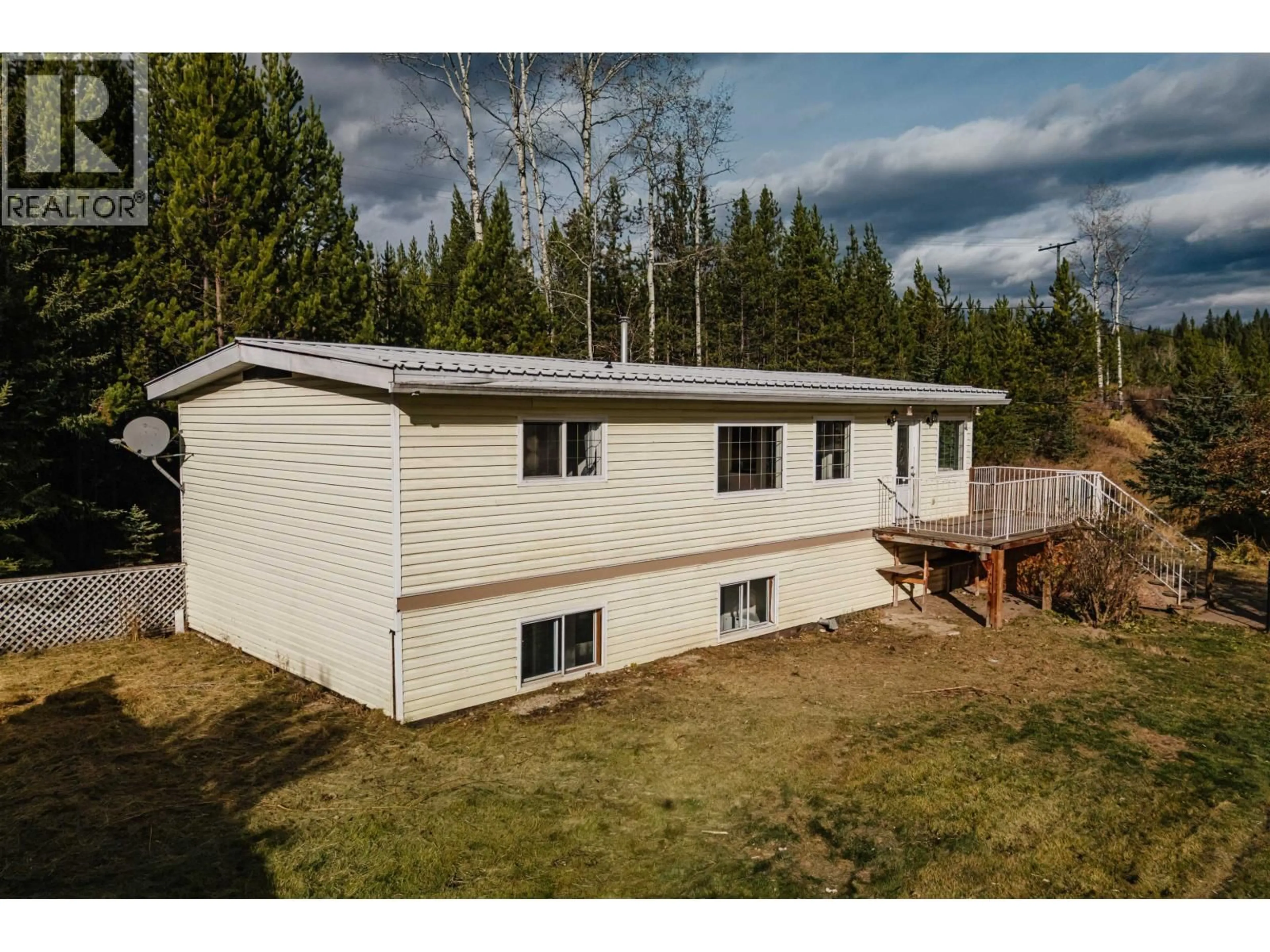 A pic from outside/outdoor area/front of a property/back of a property/a pic from drone, building for 5098 PERKINS ROAD, 100 Mile House British Columbia V0K2E0