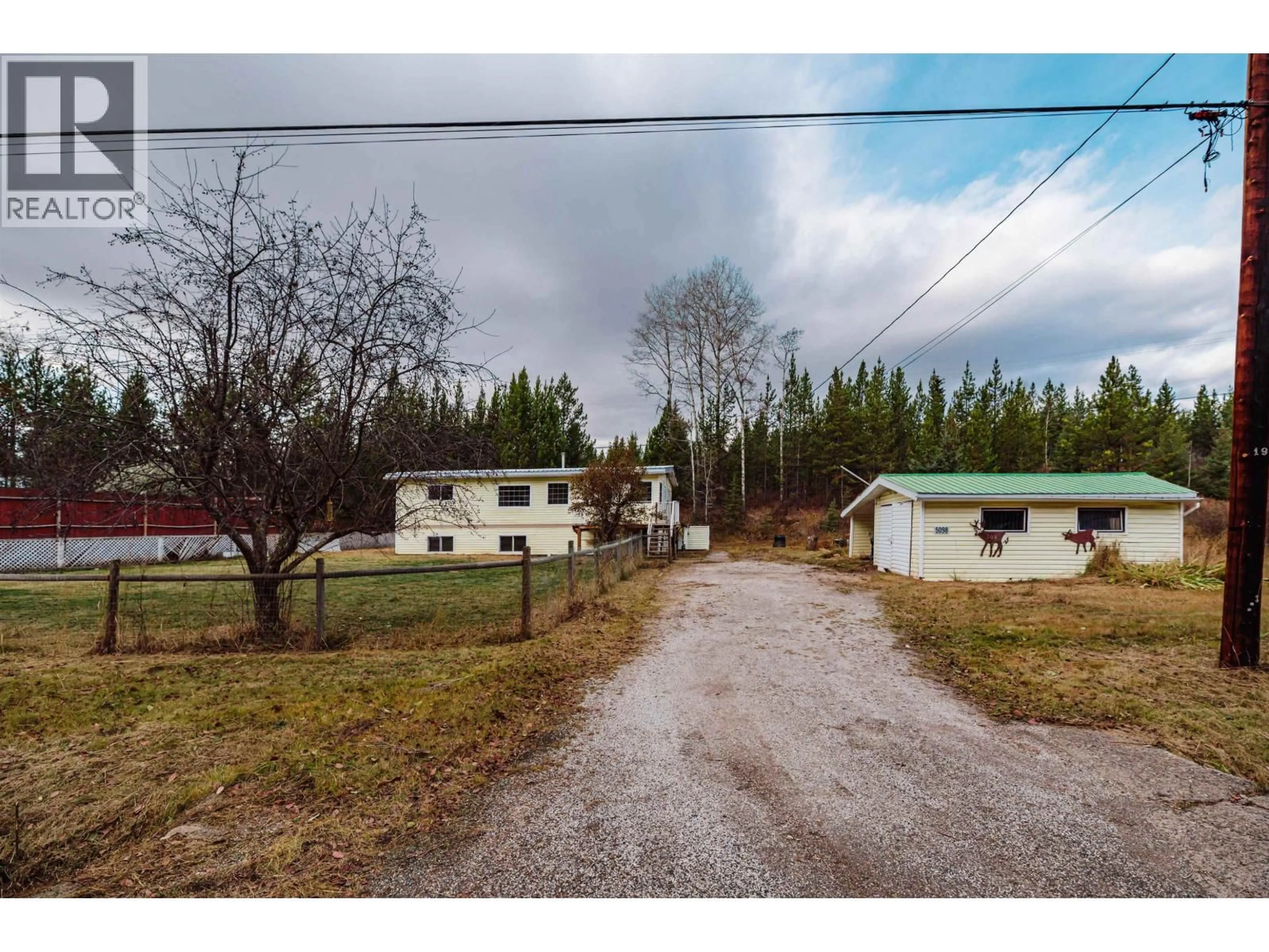 A pic from outside/outdoor area/front of a property/back of a property/a pic from drone, street for 5098 PERKINS ROAD, 100 Mile House British Columbia V0K2E0