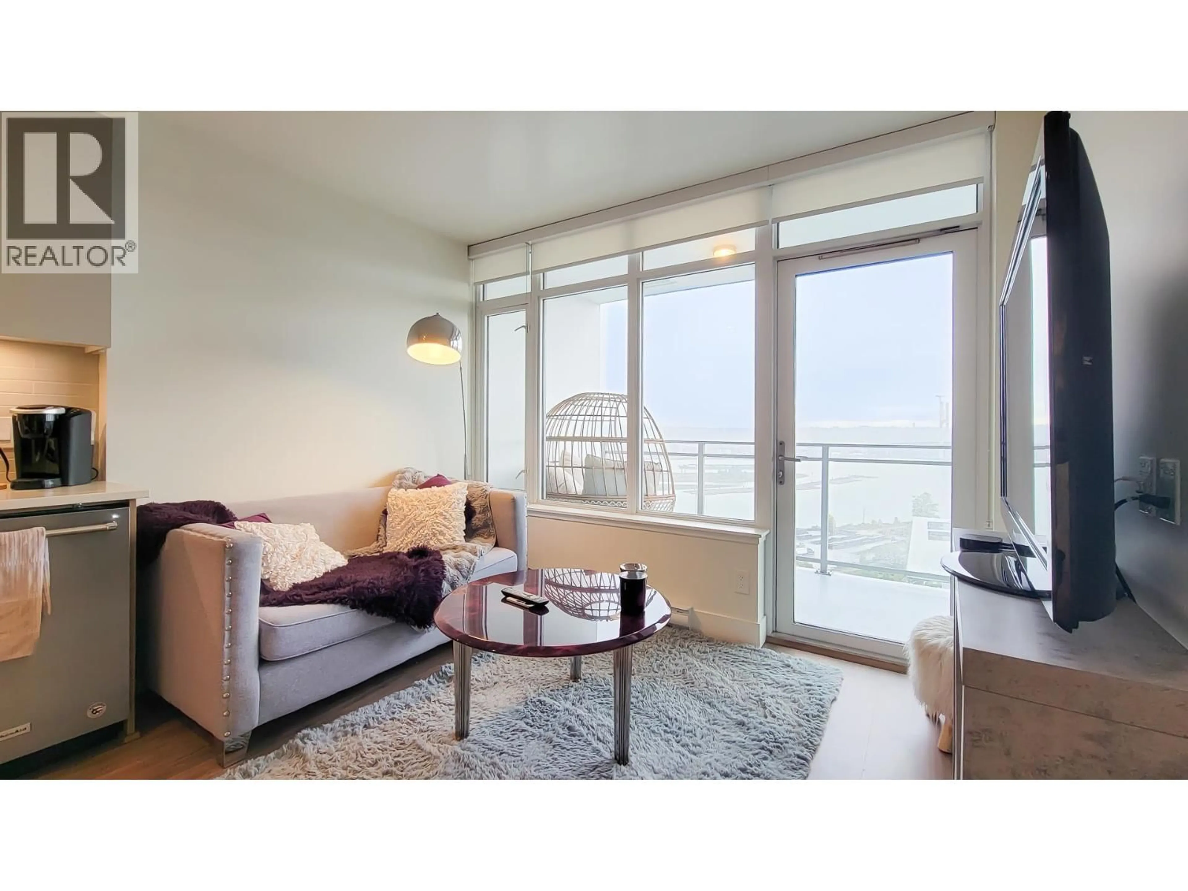 Living room with furniture, wood/laminate floor for 2101 - 258 NELSON'S COURT, New Westminster British Columbia V3L0J9