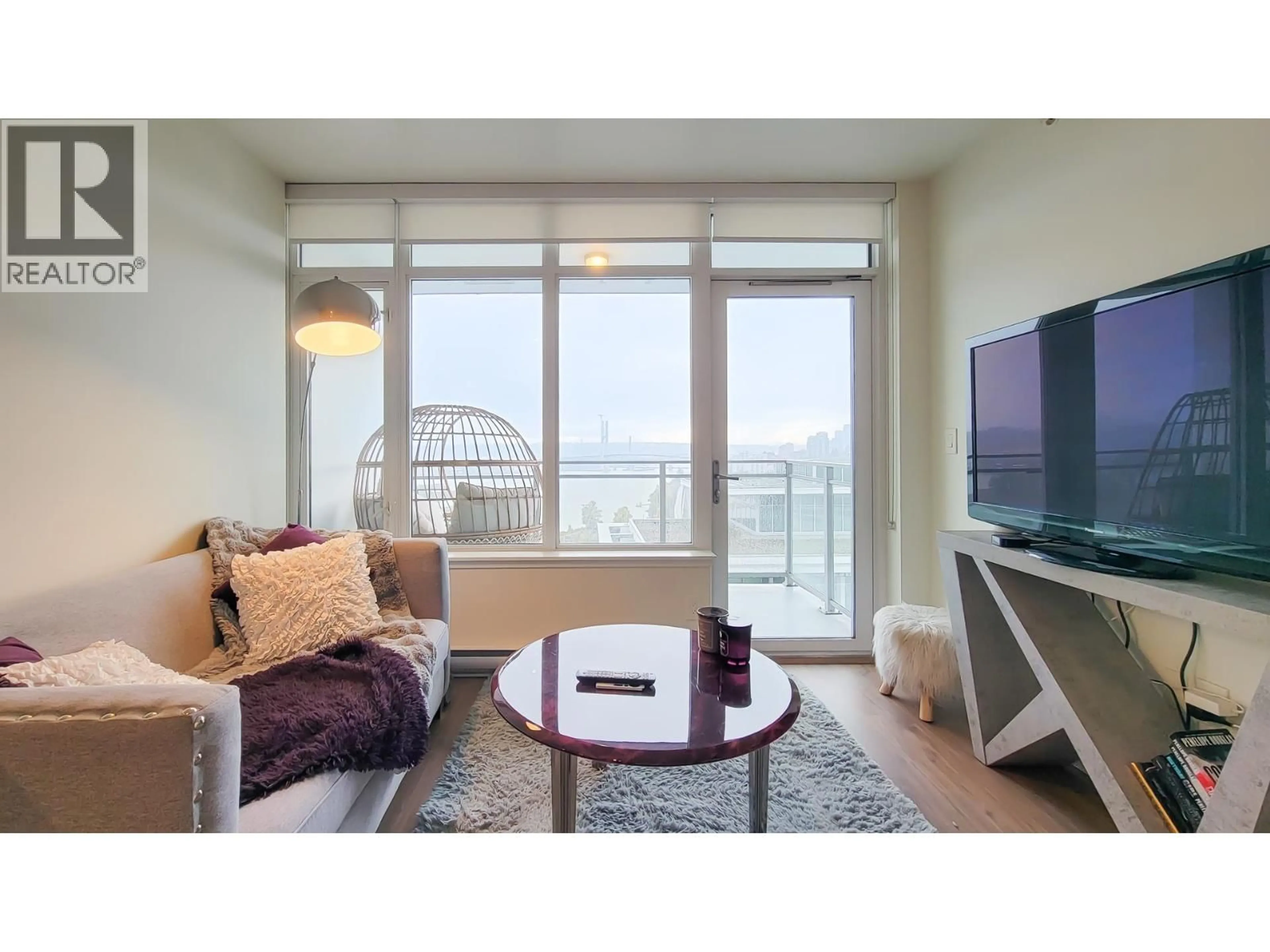 Living room with furniture, wood/laminate floor for 2101 - 258 NELSON'S COURT, New Westminster British Columbia V3L0J9