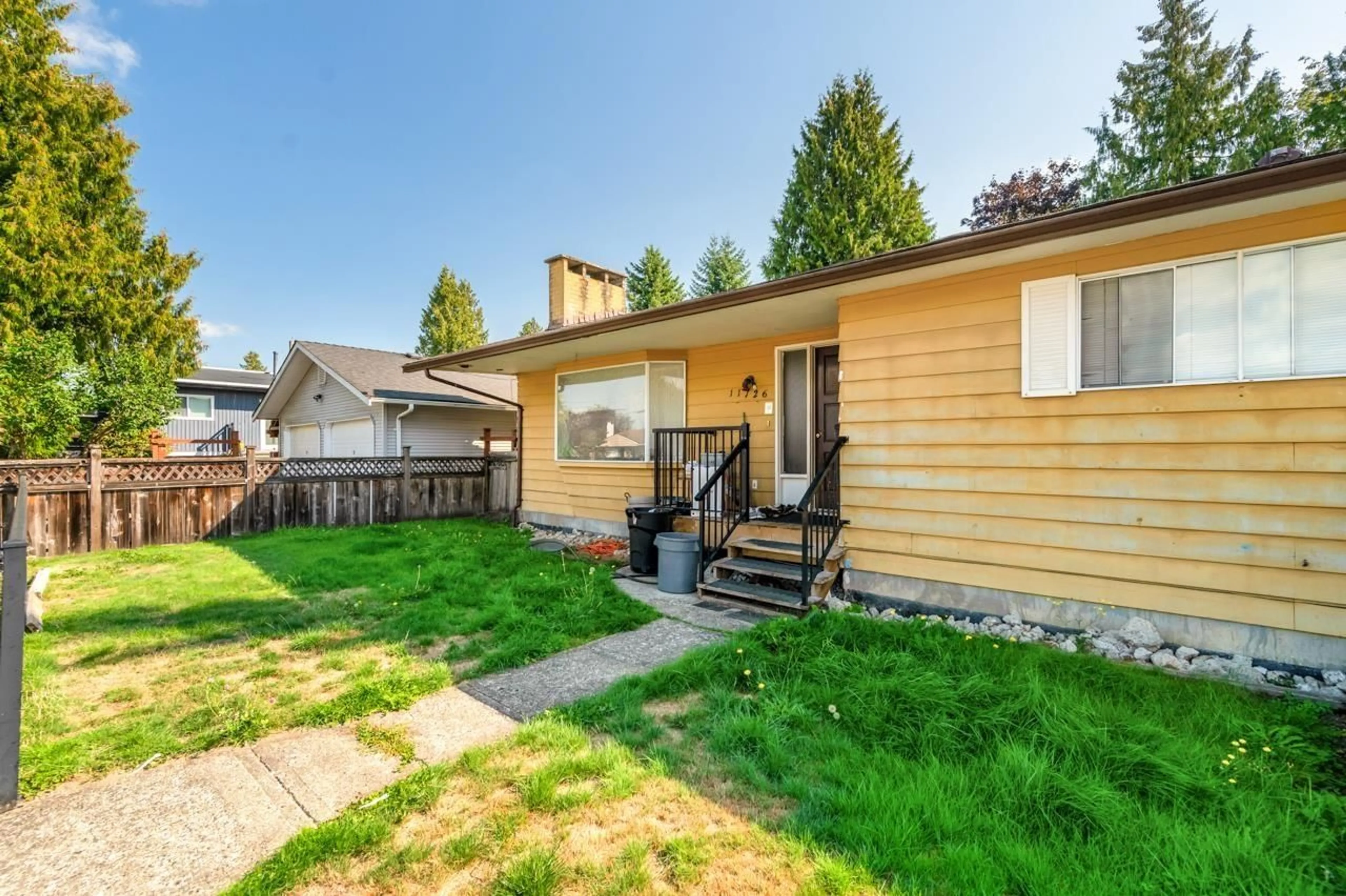 Home with vinyl exterior material, street for 11726 94A, Delta British Columbia V4C3S3