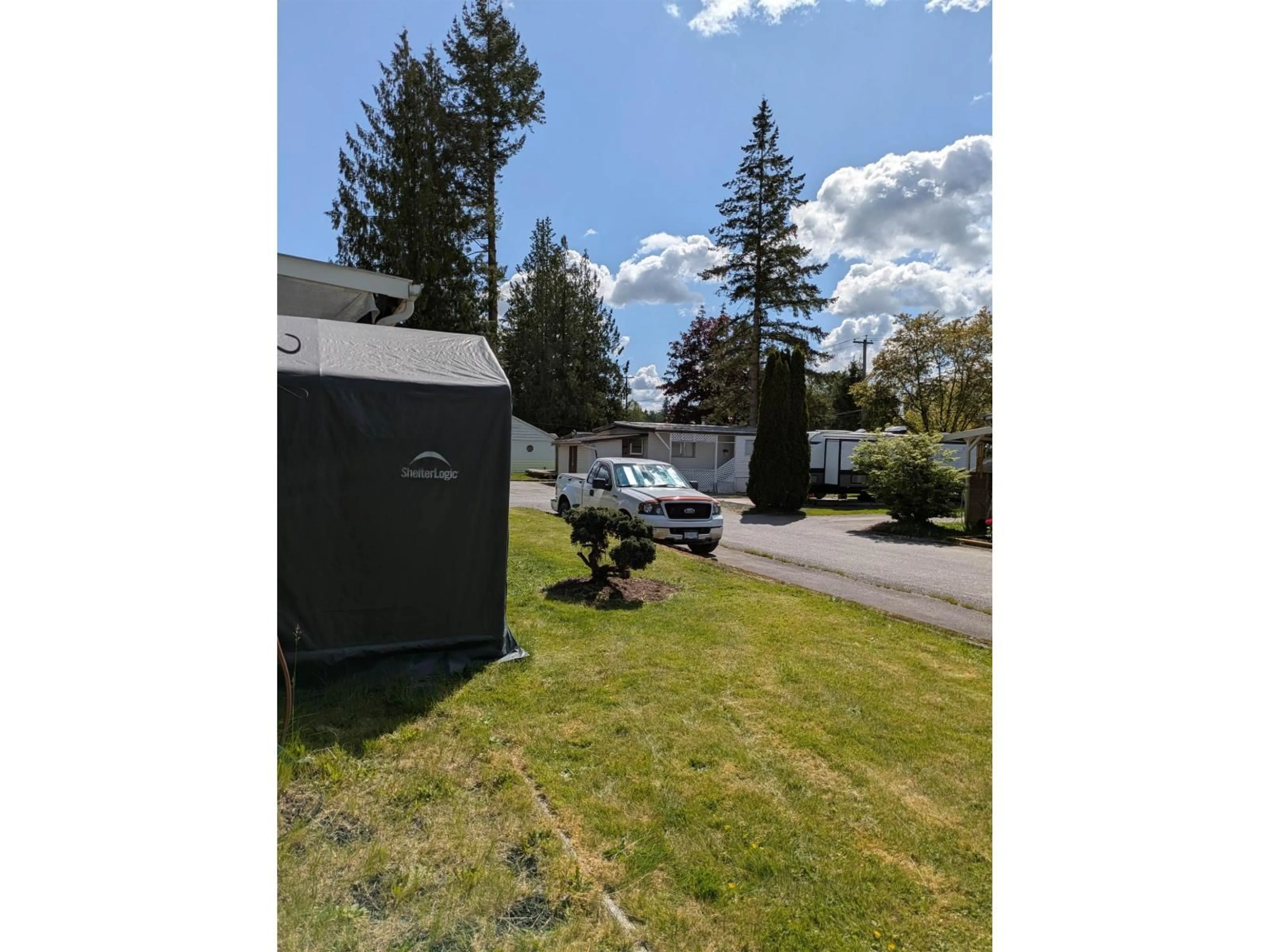 A pic from outside/outdoor area/front of a property/back of a property/a pic from drone, street for 5 - 23141 72, Langley British Columbia V2Y2R9