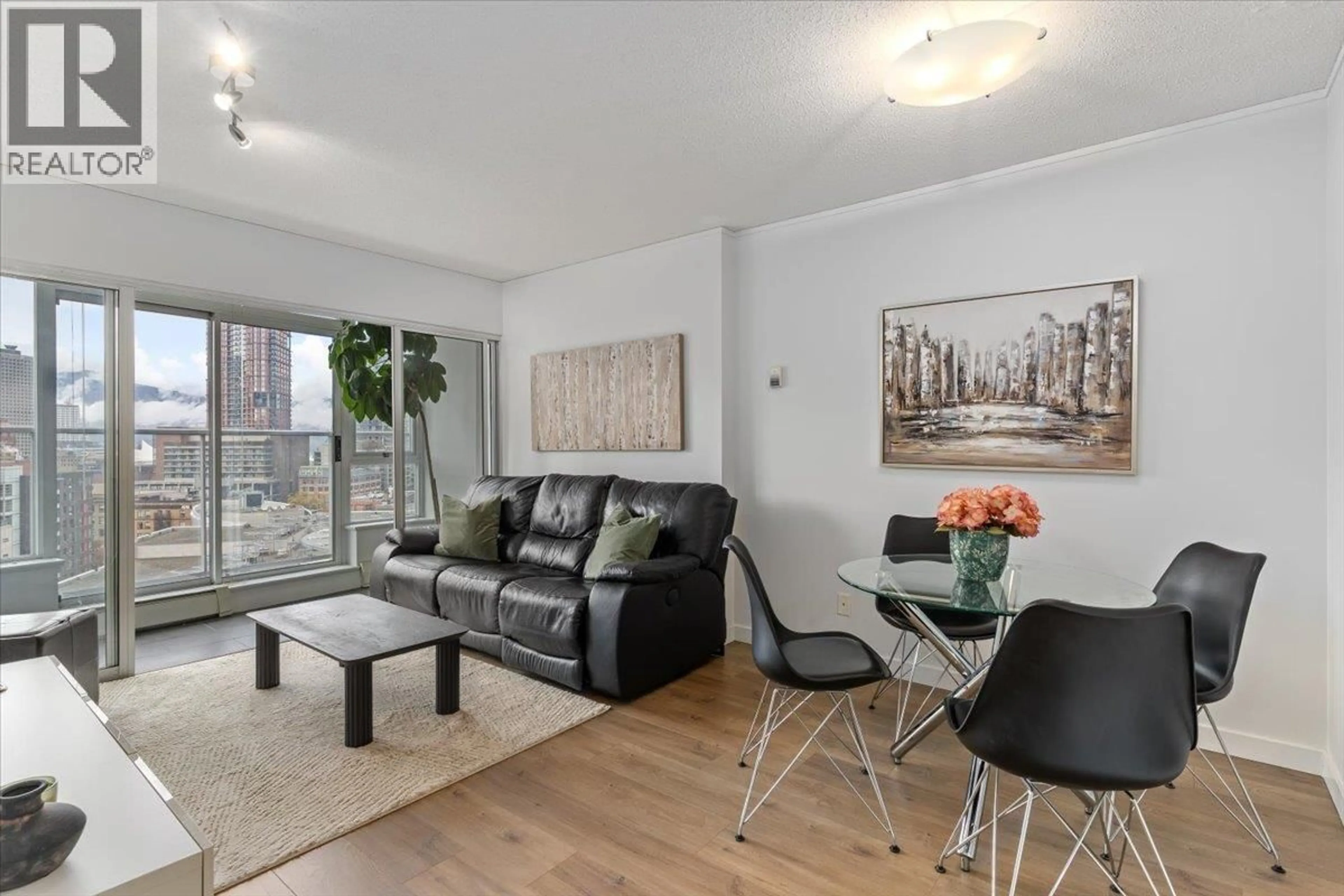 Living room with furniture, wood/laminate floor for 1805 - 58 KEEFER PLACE, Vancouver British Columbia V6B0B8