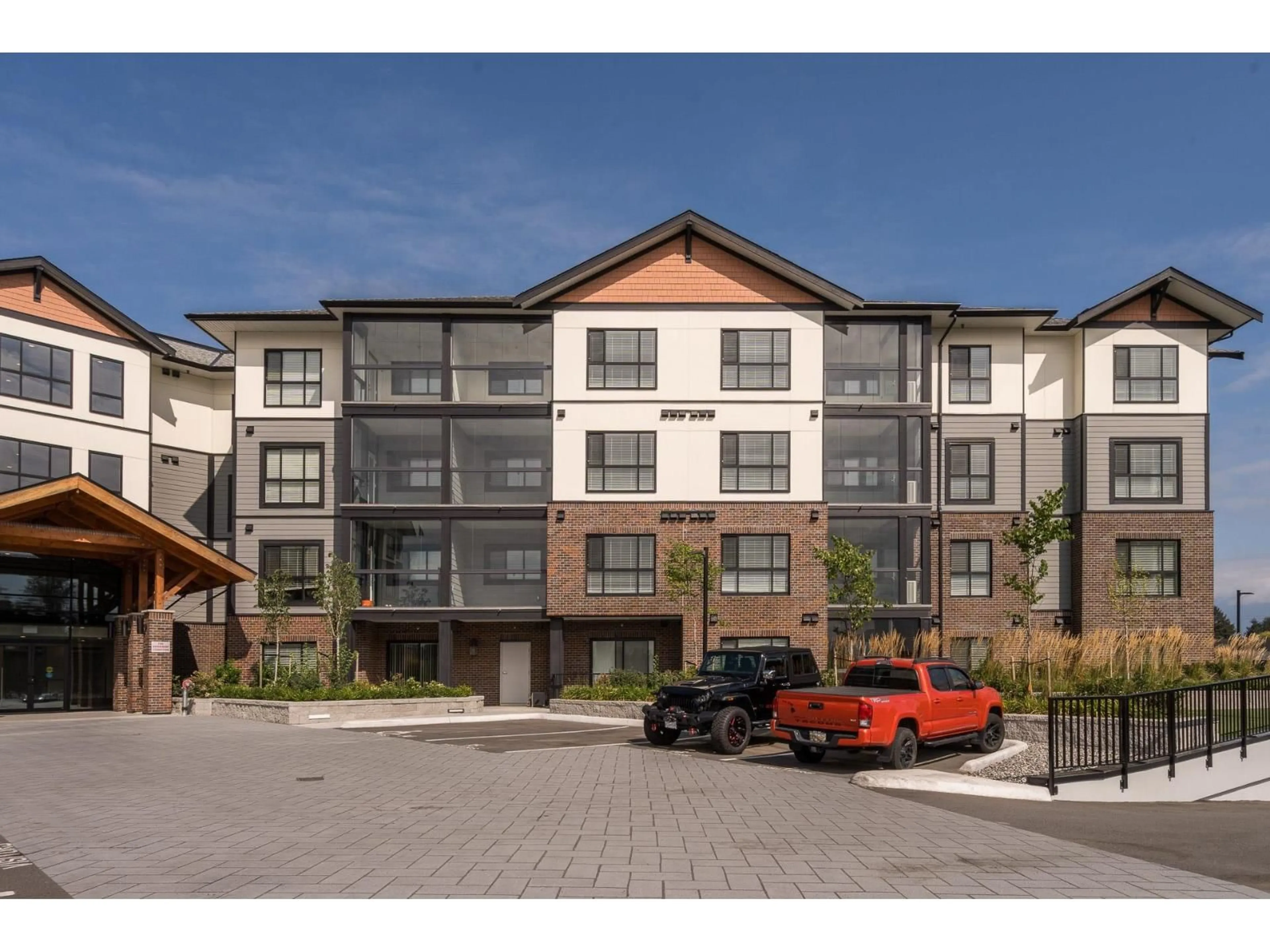 A pic from outside/outdoor area/front of a property/back of a property/a pic from drone, unknown for 202 - 8497 YOUNG ROAD, Chilliwack British Columbia V2P4P2