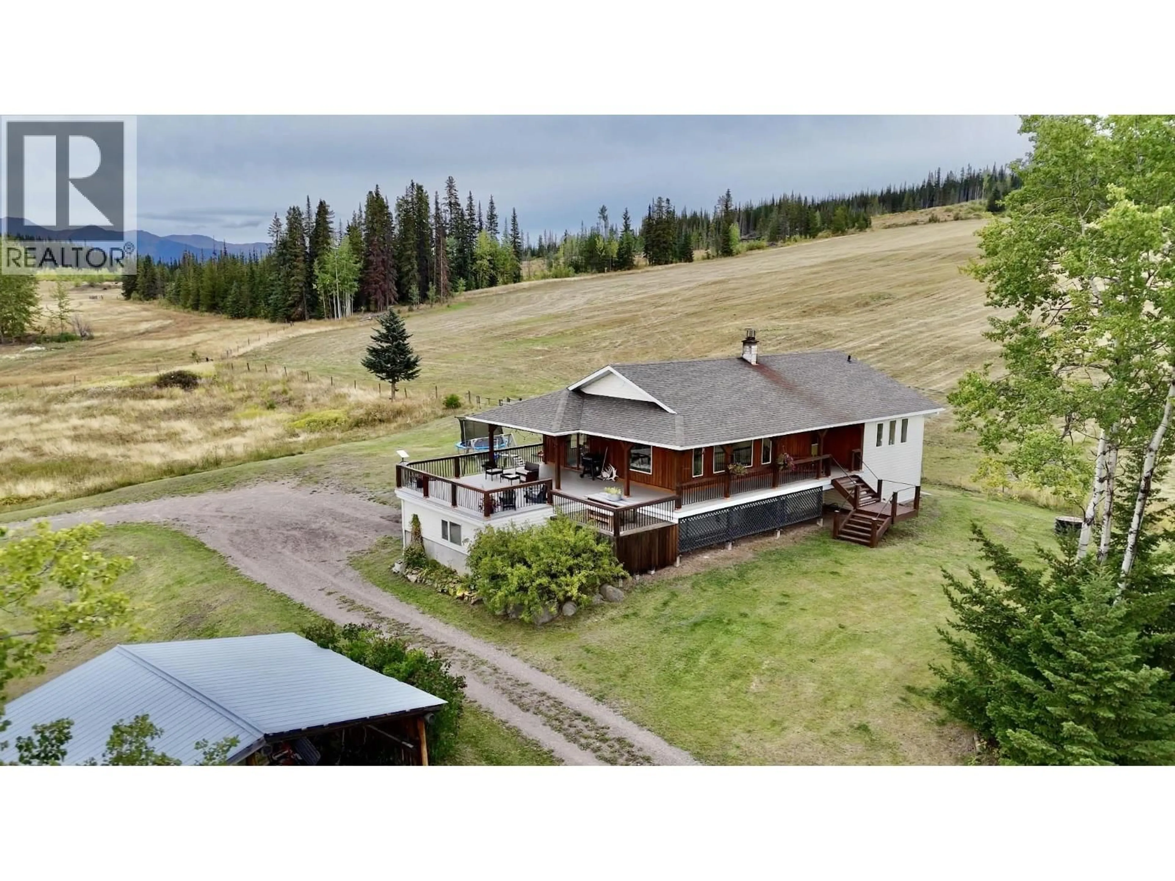 A pic from outside/outdoor area/front of a property/back of a property/a pic from drone, mountain view for 6667 BOUNDARY ROAD, Telkwa British Columbia V0J2X2