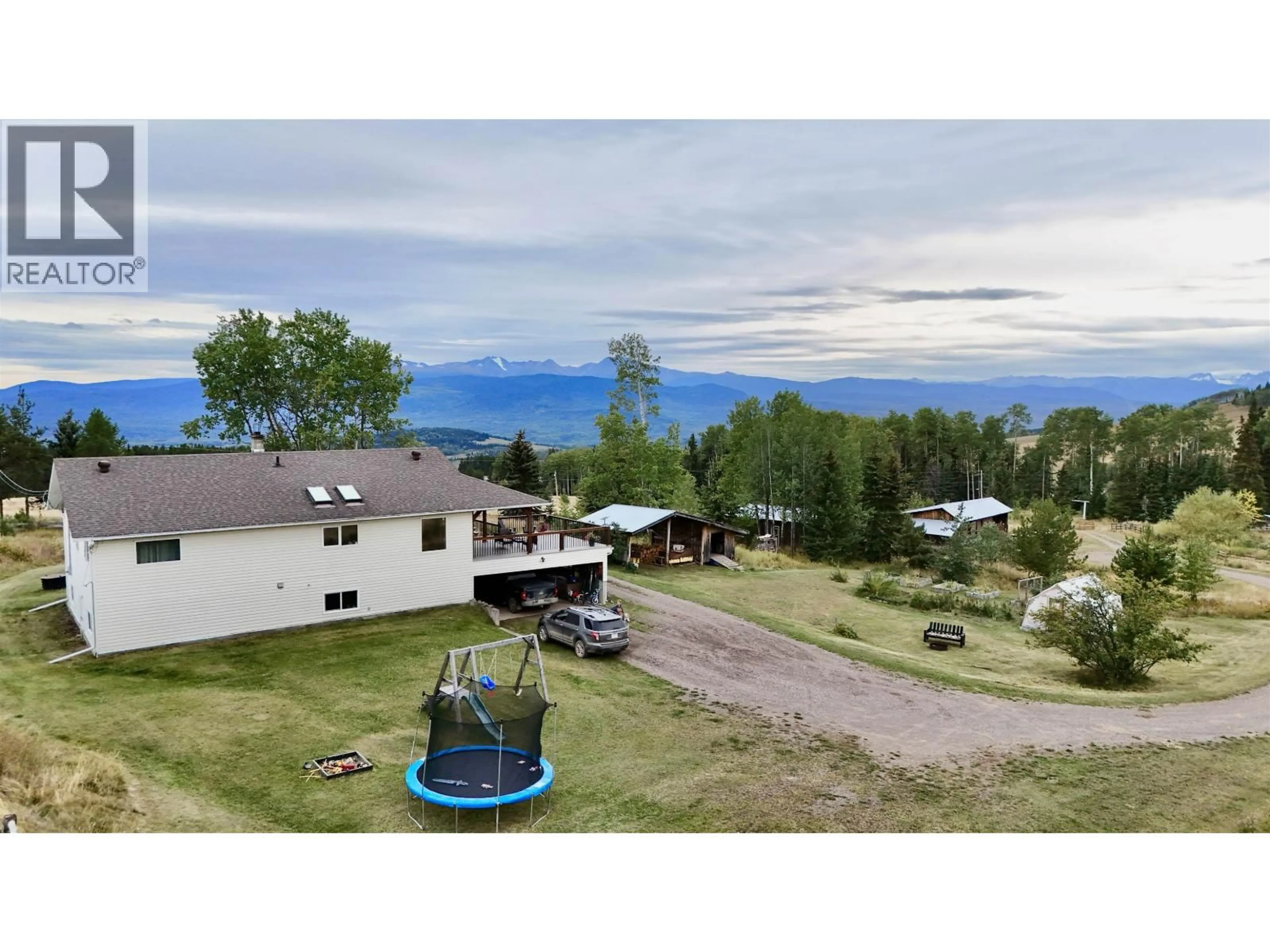 A pic from outside/outdoor area/front of a property/back of a property/a pic from drone, mountain view for 6667 BOUNDARY ROAD, Telkwa British Columbia V0J2X2