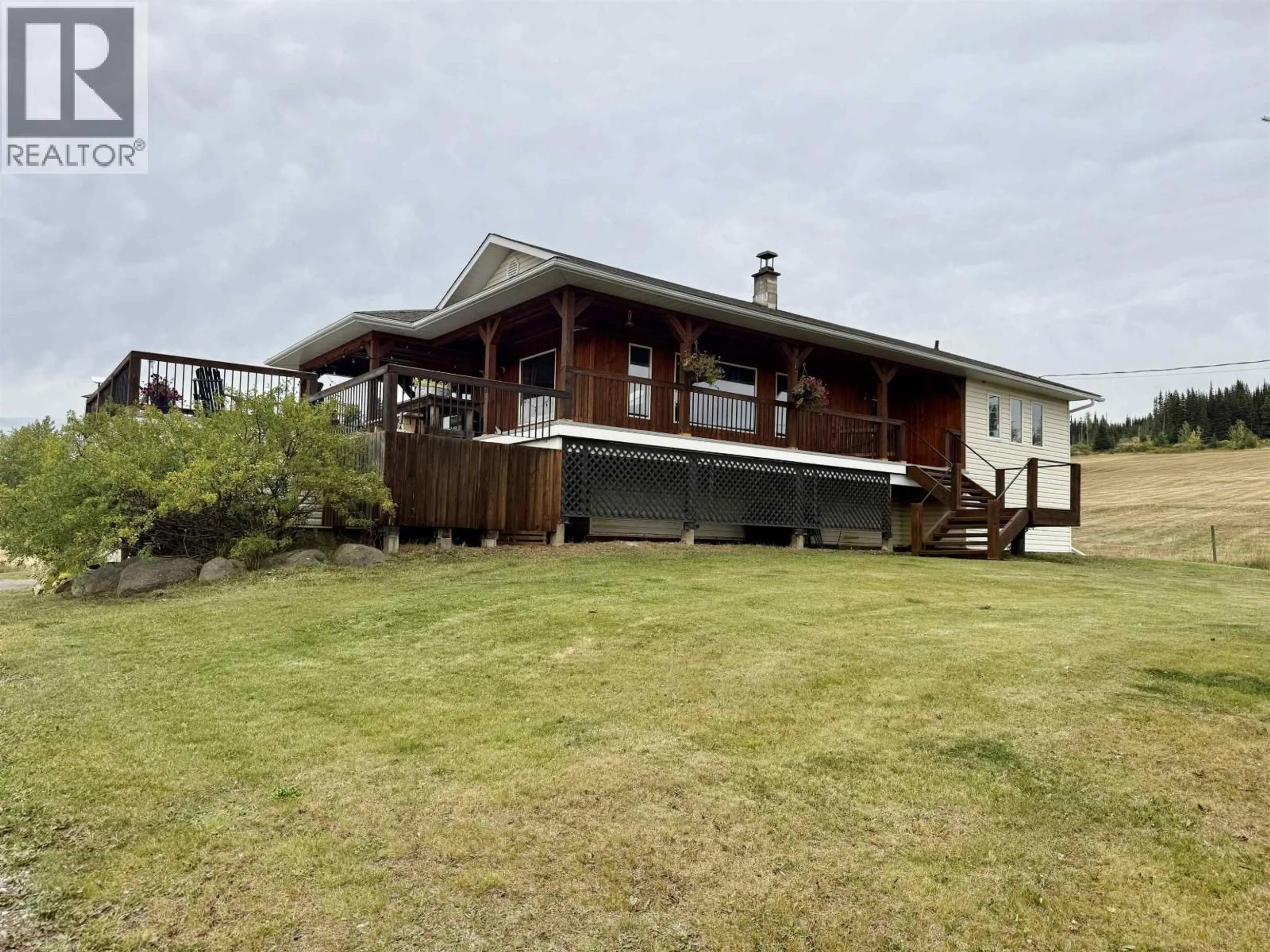 A pic from outside/outdoor area/front of a property/back of a property/a pic from drone, building for 6667 BOUNDARY ROAD, Telkwa British Columbia V0J2X2