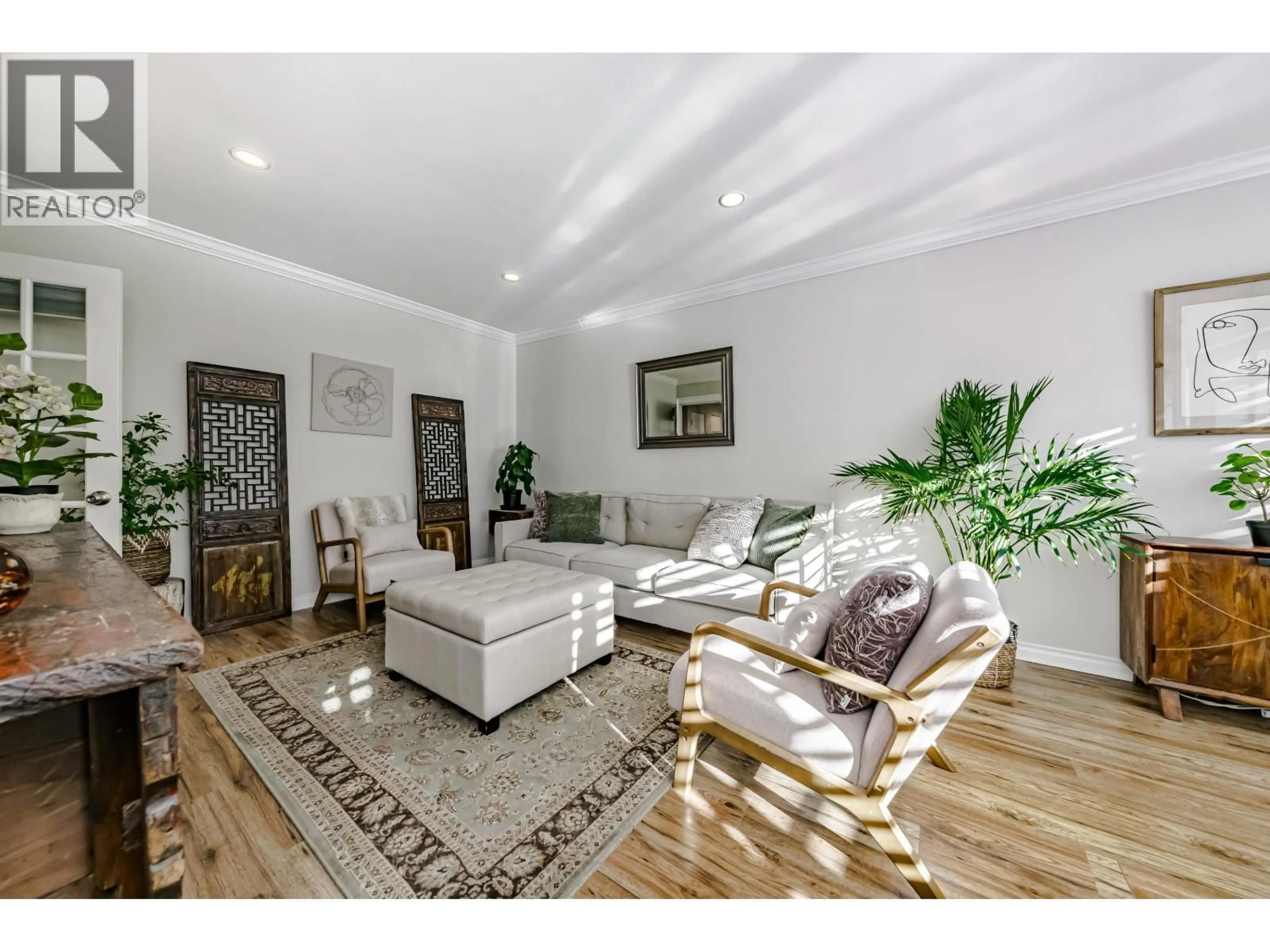 Living room with furniture, wood/laminate floor for 305 - 2430 POINT GREY ROAD, Vancouver British Columbia V6K1A2