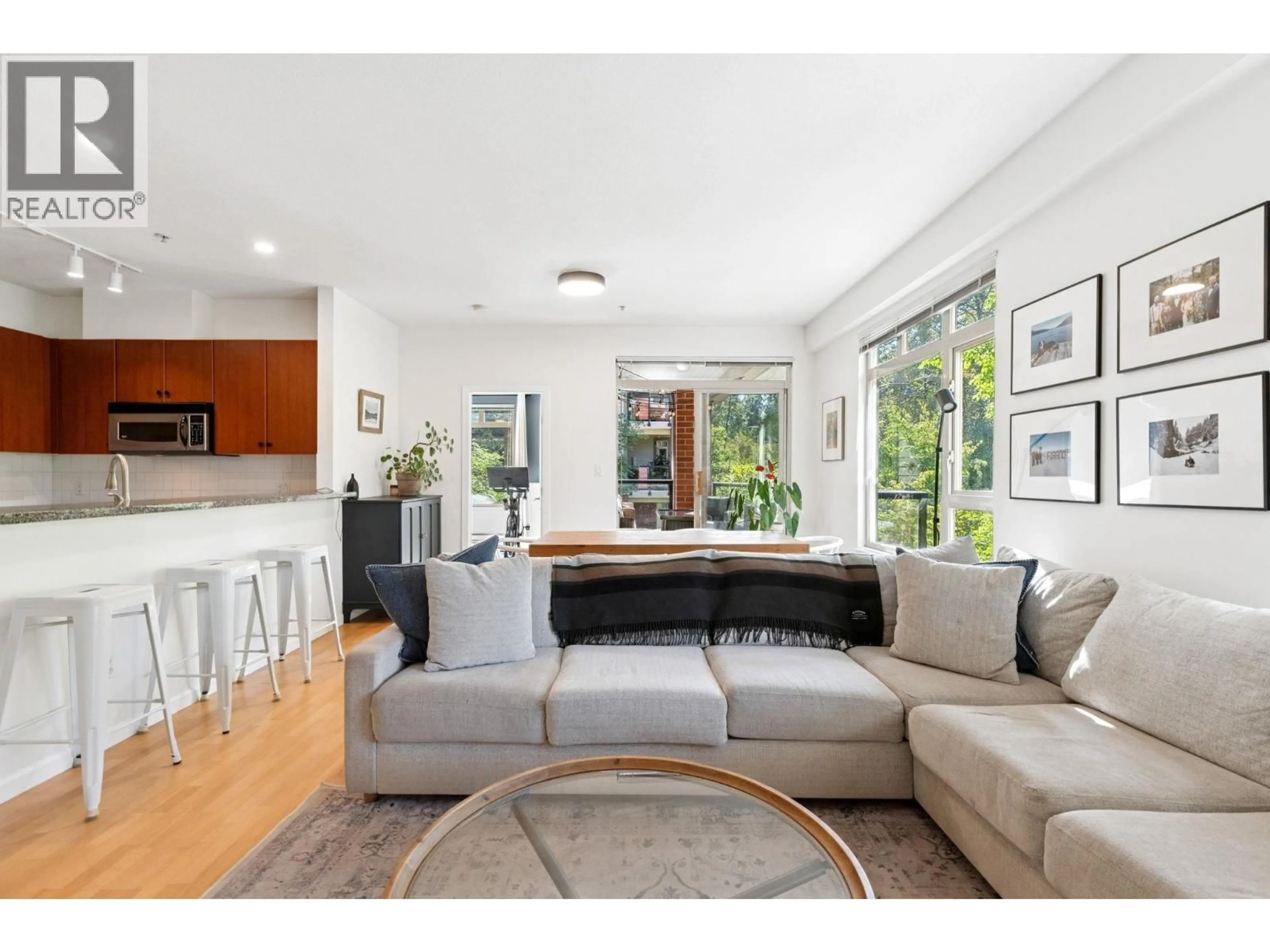 Living room with furniture, unknown for 219 - 100 CAPILANO ROAD, Port Moody British Columbia V3H5M9