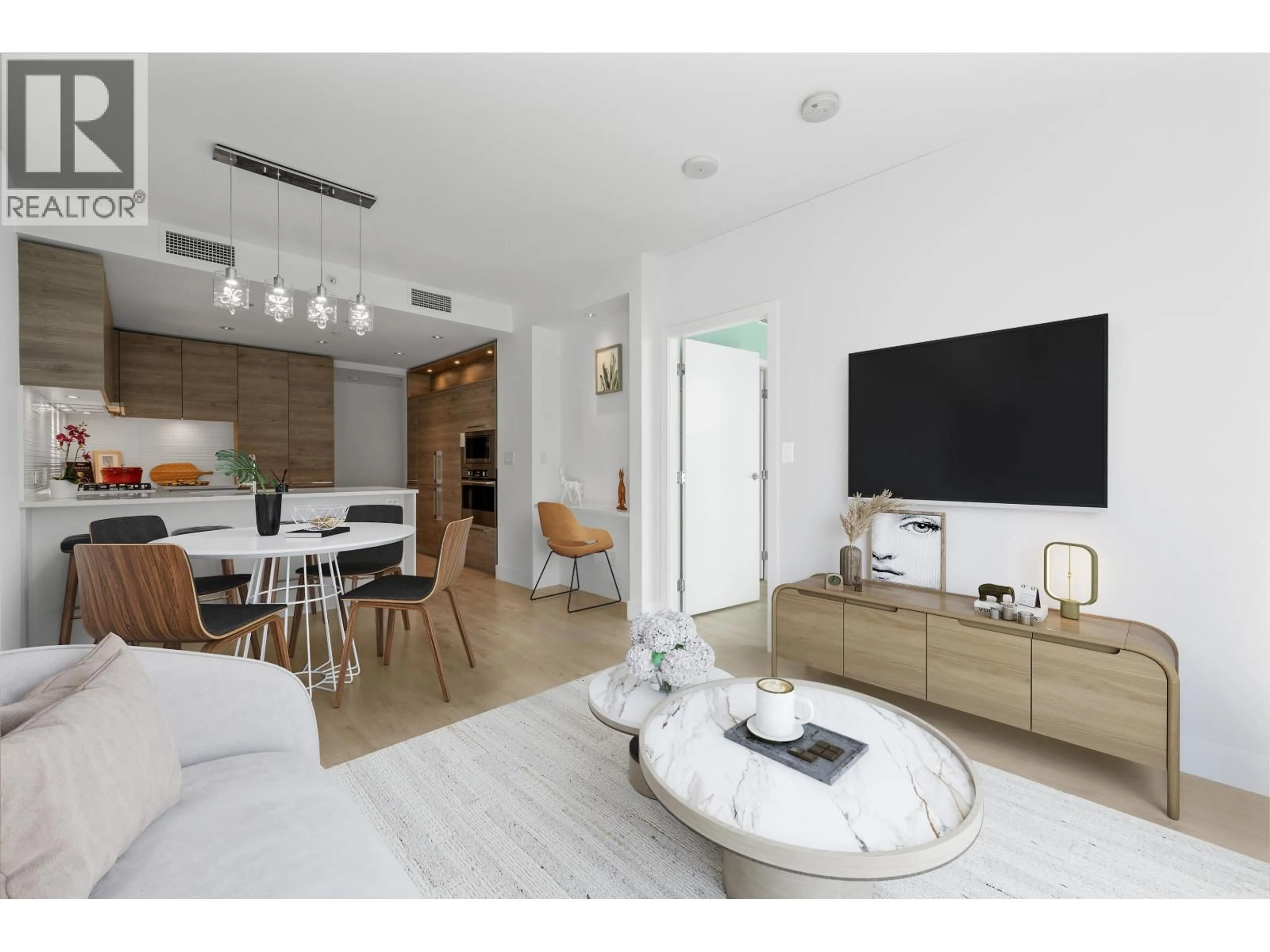 Living room with furniture, unknown for 410 - 7388 KINGSWAY, Burnaby British Columbia V3N0G9