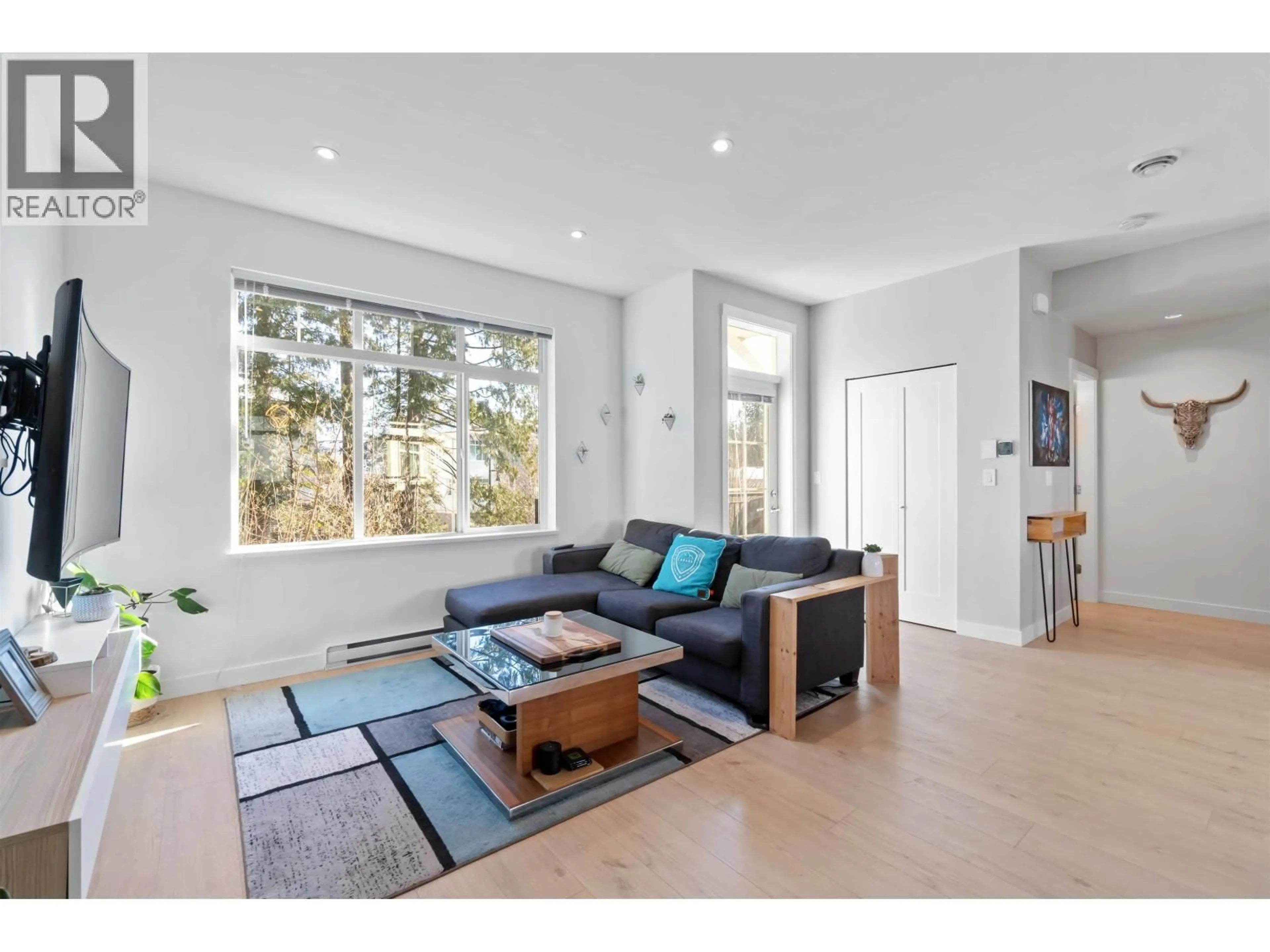 Living room with furniture, wood/laminate floor for 125 - 1225 MITCHELL STREET, Coquitlam British Columbia V3B0R5