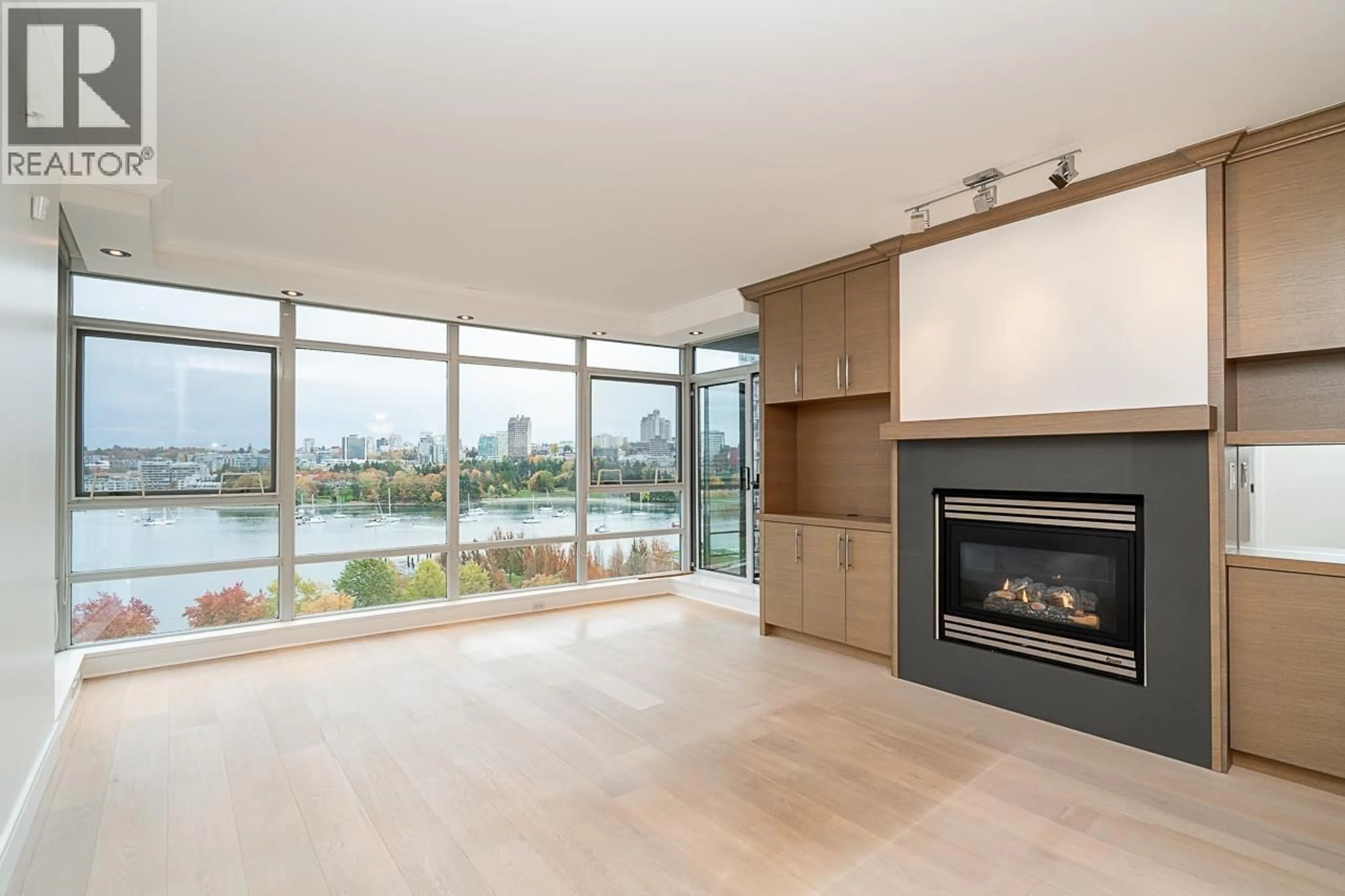 Living room with furniture, wood/laminate floor for 1003 - 1483 HOMER STREET, Vancouver British Columbia V6Z3C7