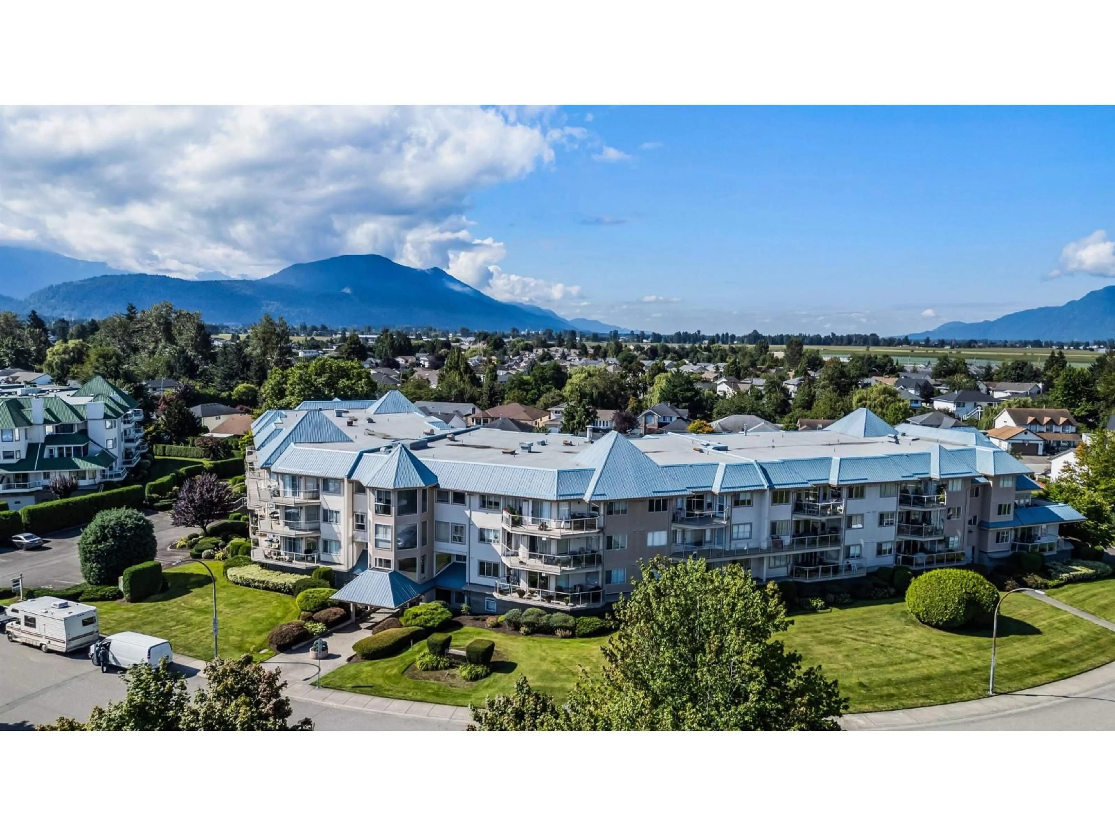 A pic from outside/outdoor area/front of a property/back of a property/a pic from drone, mountain view for 204 - 7685 AMBER DRIVE, Chilliwack British Columbia V2R3P3