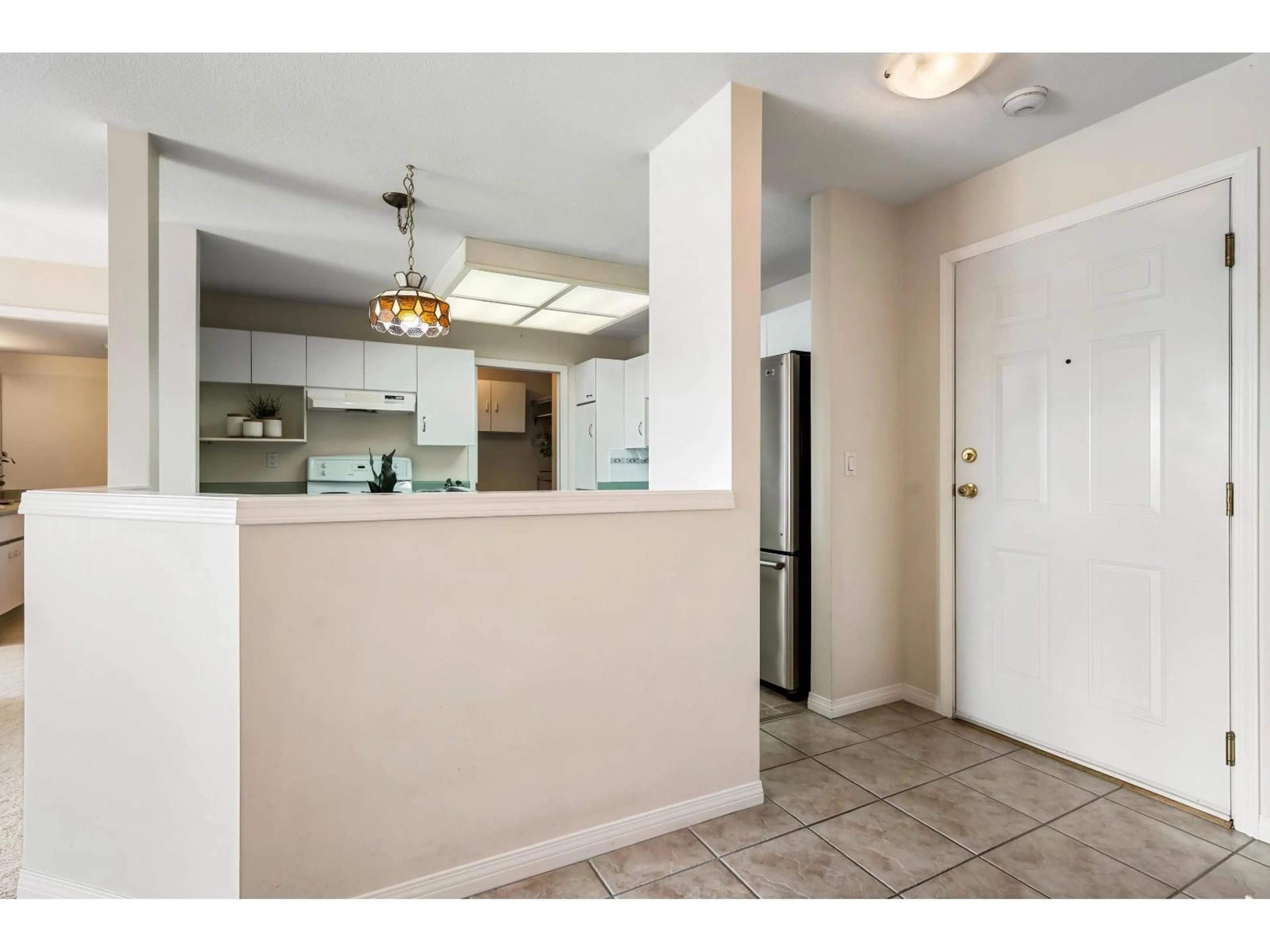 Standard kitchen, ceramic/tile floor for 204 - 7685 AMBER DRIVE, Chilliwack British Columbia V2R3P3