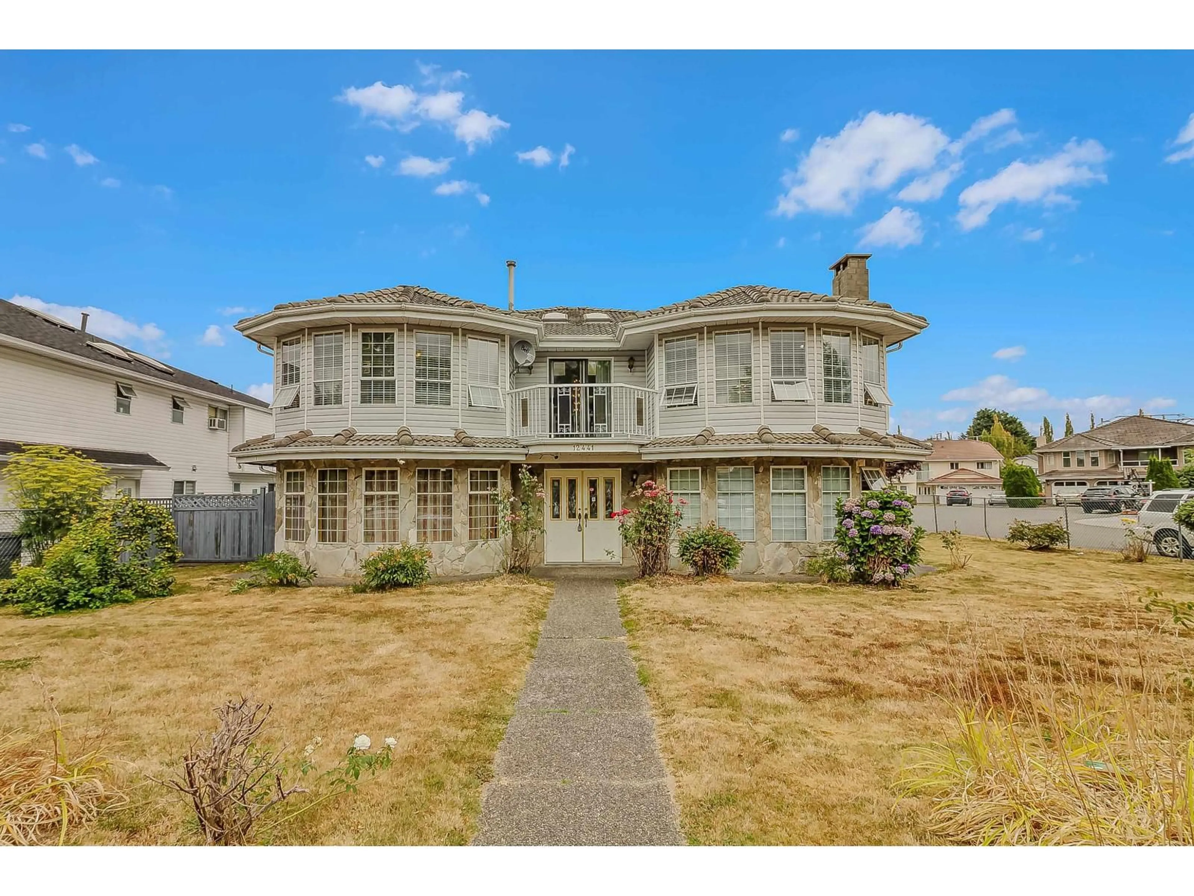 A pic from outside/outdoor area/front of a property/back of a property/a pic from drone, building for 12441 71A, Surrey British Columbia V3W0P7