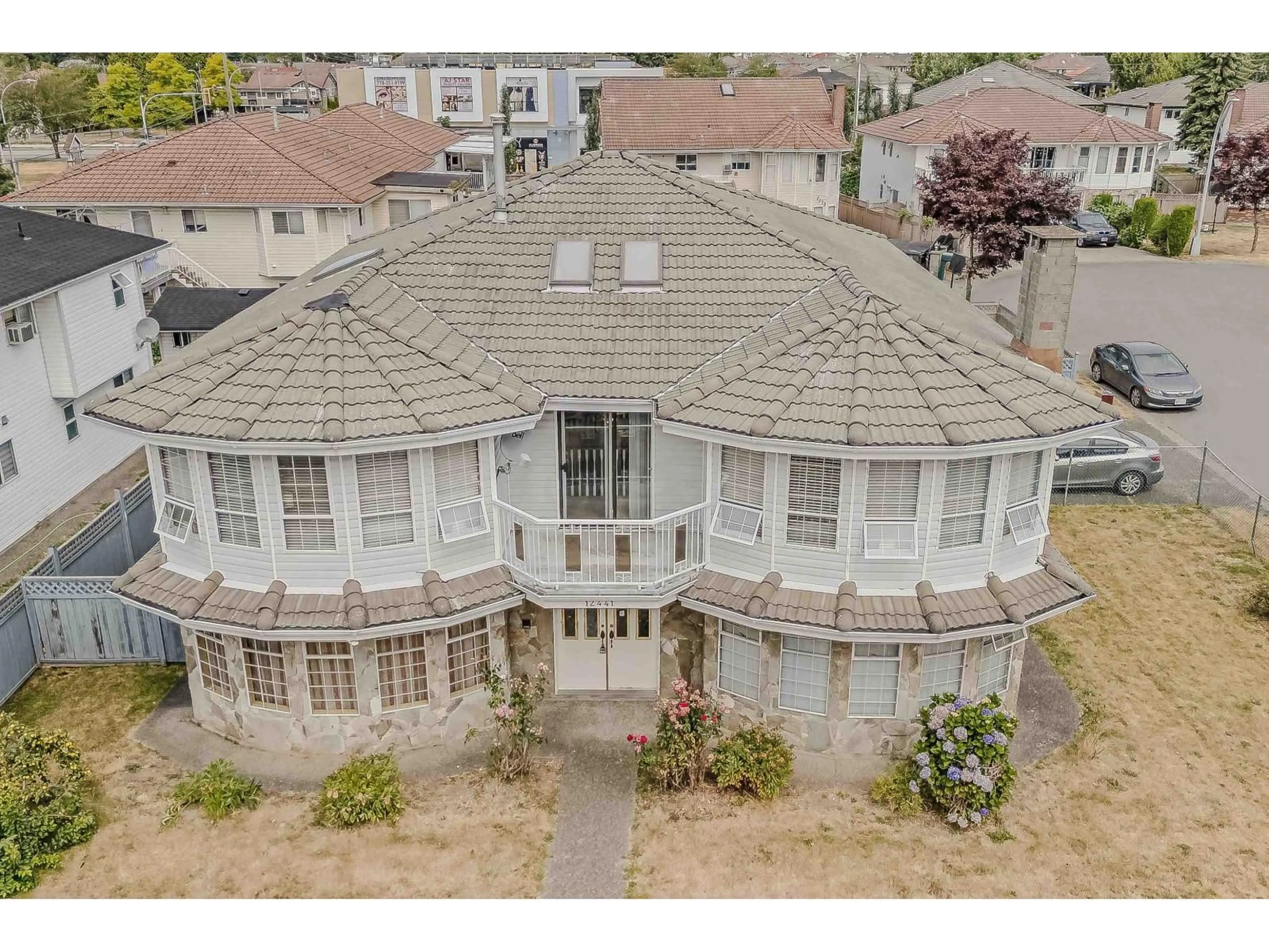 A pic from outside/outdoor area/front of a property/back of a property/a pic from drone, city buildings view from balcony for 12441 71A, Surrey British Columbia V3W0P7