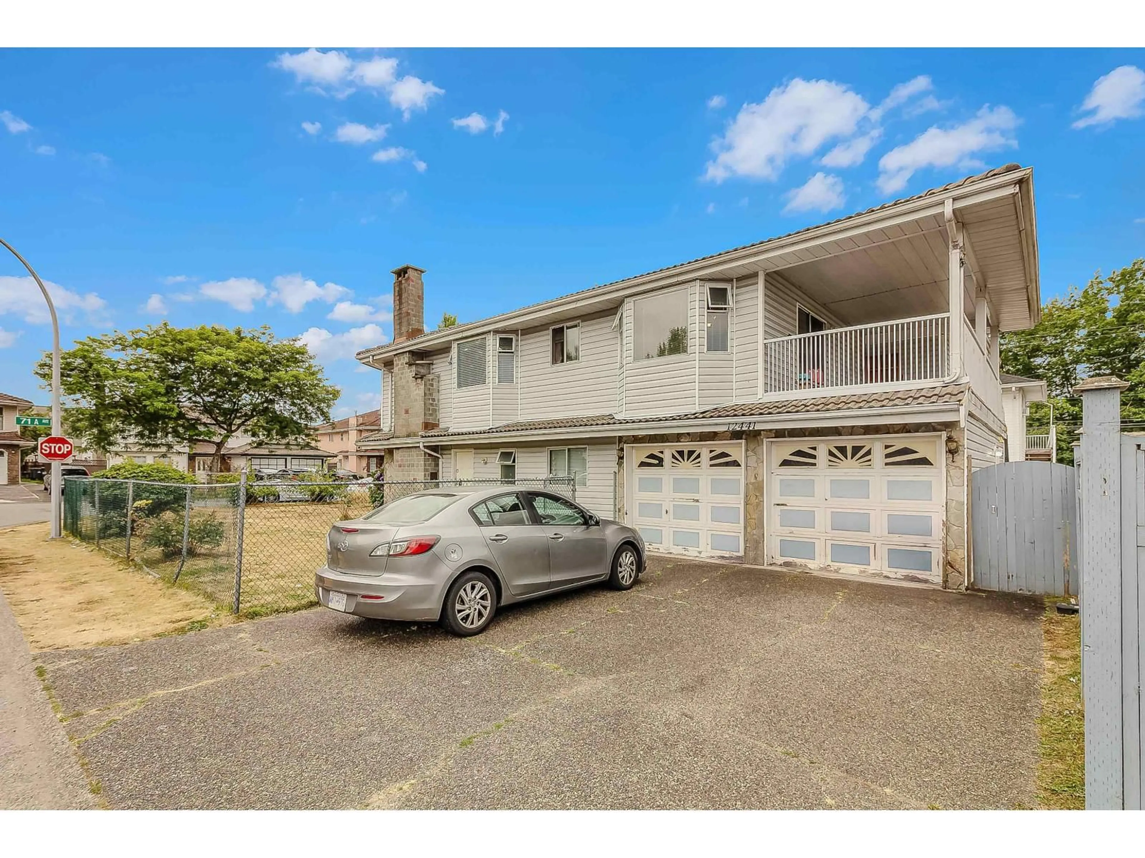 A pic from outside/outdoor area/front of a property/back of a property/a pic from drone, street for 12441 71A, Surrey British Columbia V3W0P7