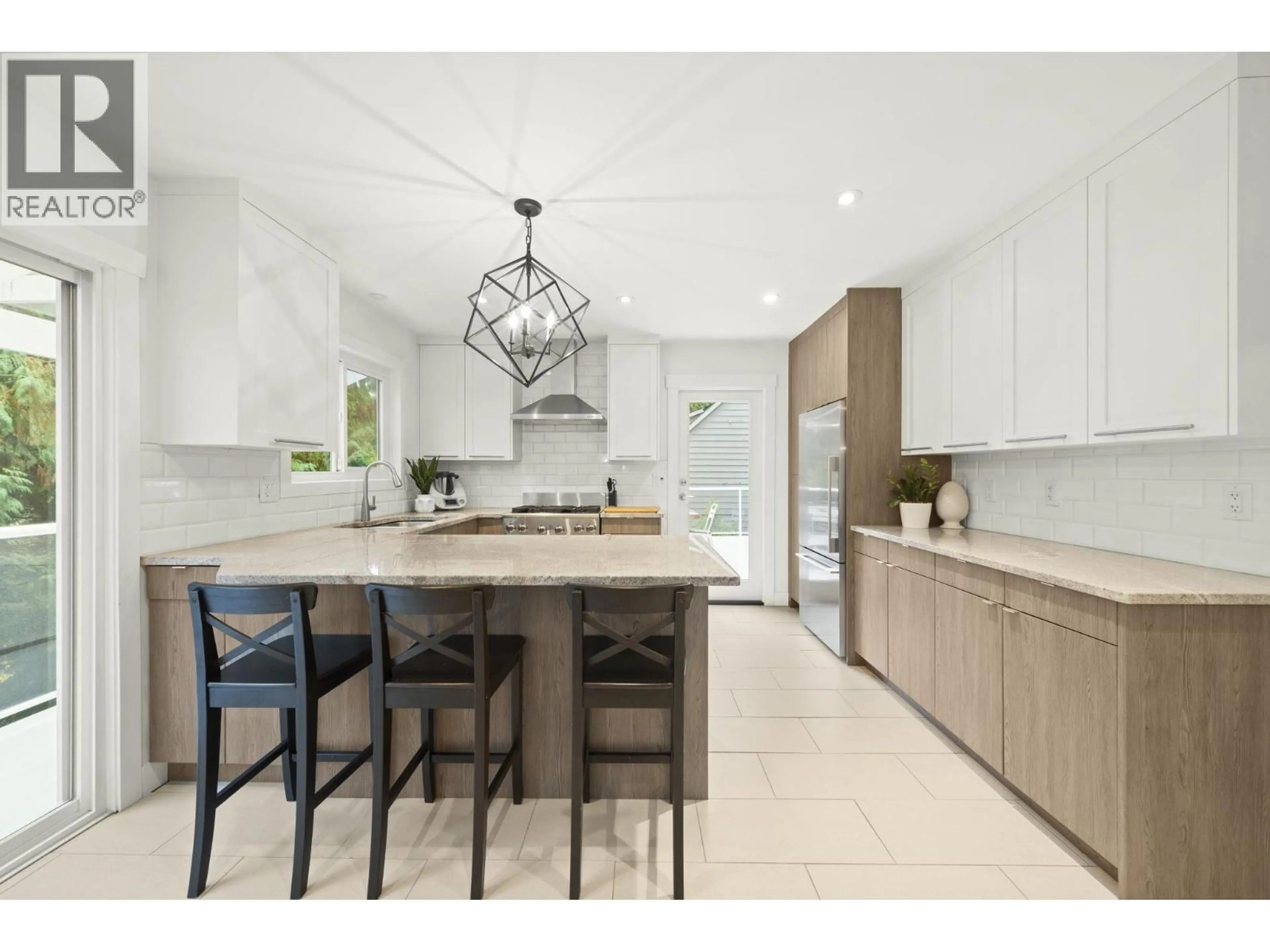 Open concept kitchen, ceramic/tile floor for 5540 GREENLEAF ROAD, Vancouver British Columbia V7W1N6