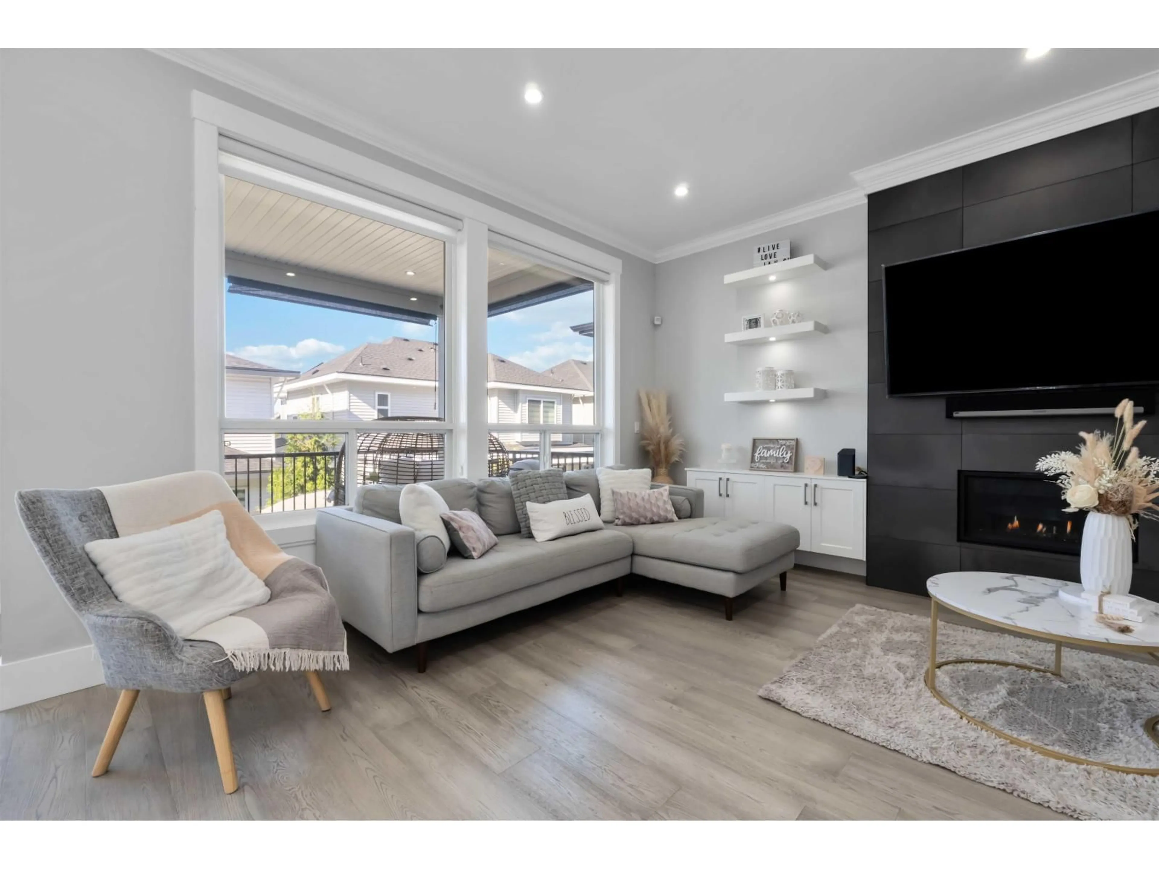 Living room with furniture, wood/laminate floor for 14239 61B, Surrey British Columbia V3X0K5