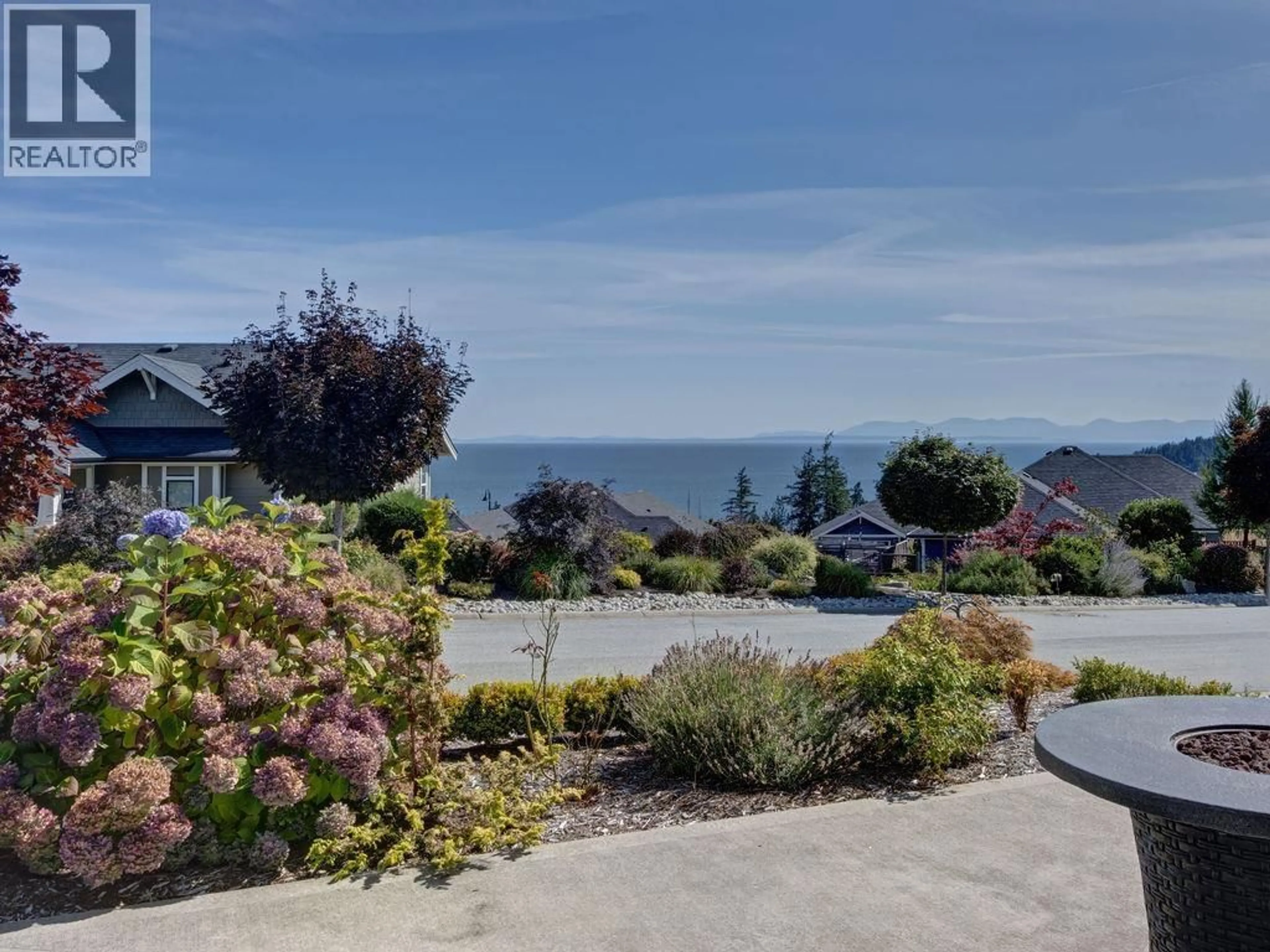 A pic from outside/outdoor area/front of a property/back of a property/a pic from drone, water/lake/river/ocean view for 5537 PEREGRINE CRESCENT, Sechelt British Columbia V7Z0V5