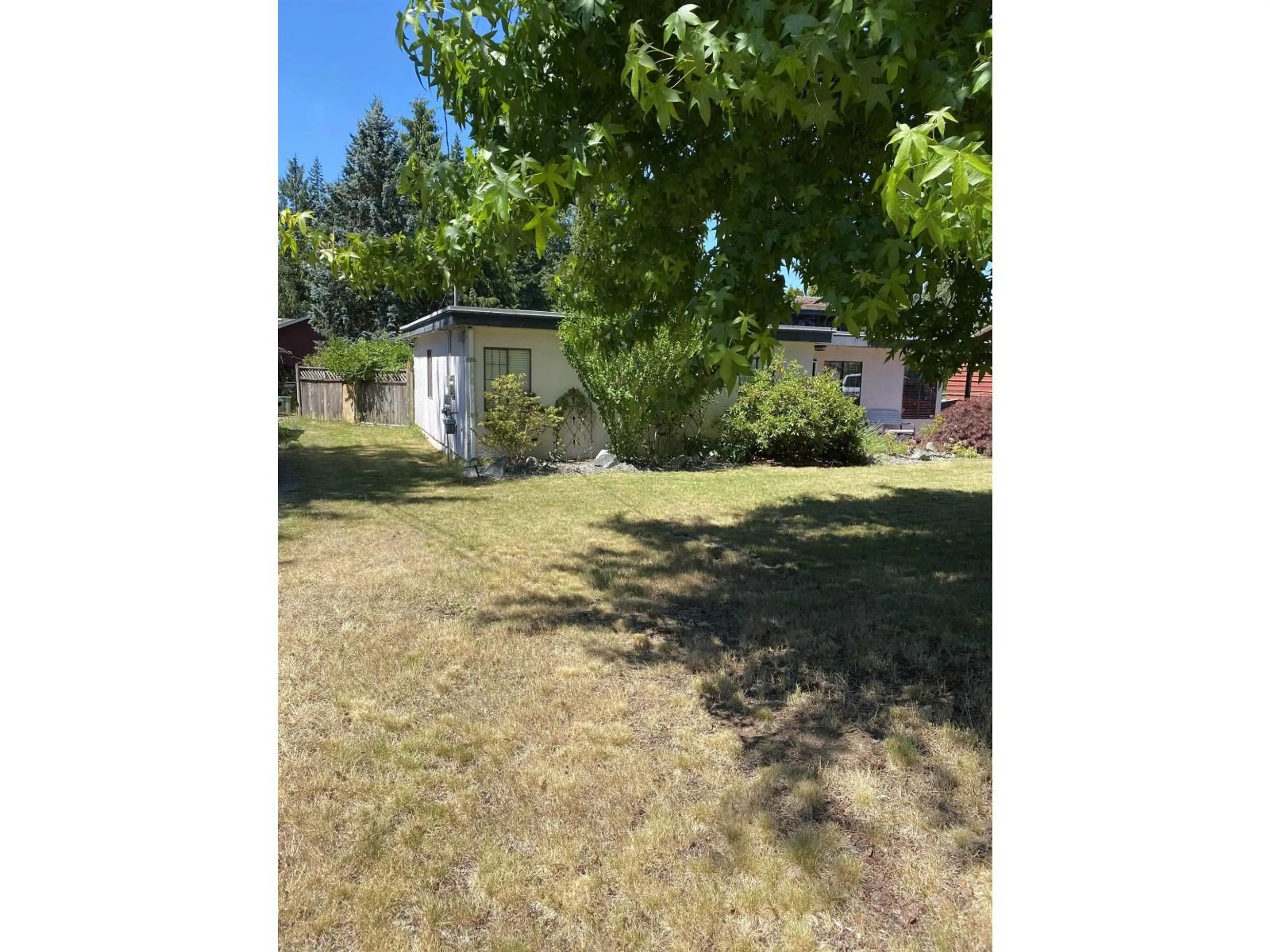 A pic from outside/outdoor area/front of a property/back of a property/a pic from drone, unknown for 3741 207B, Langley British Columbia V3A2G2