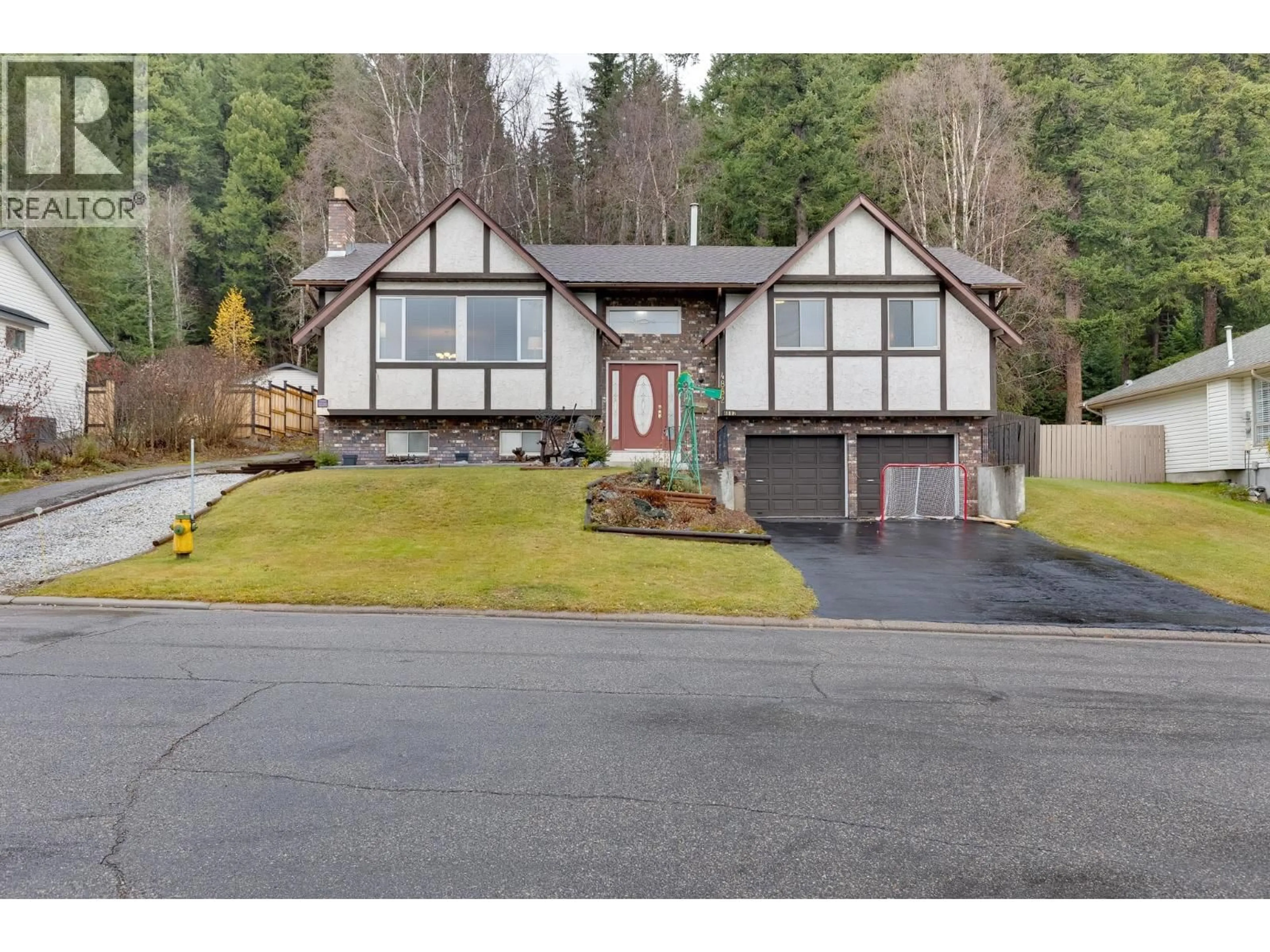 Home with vinyl exterior material, street for 4882 NORTH MEADOW ROAD, Prince George British Columbia V2K4E6