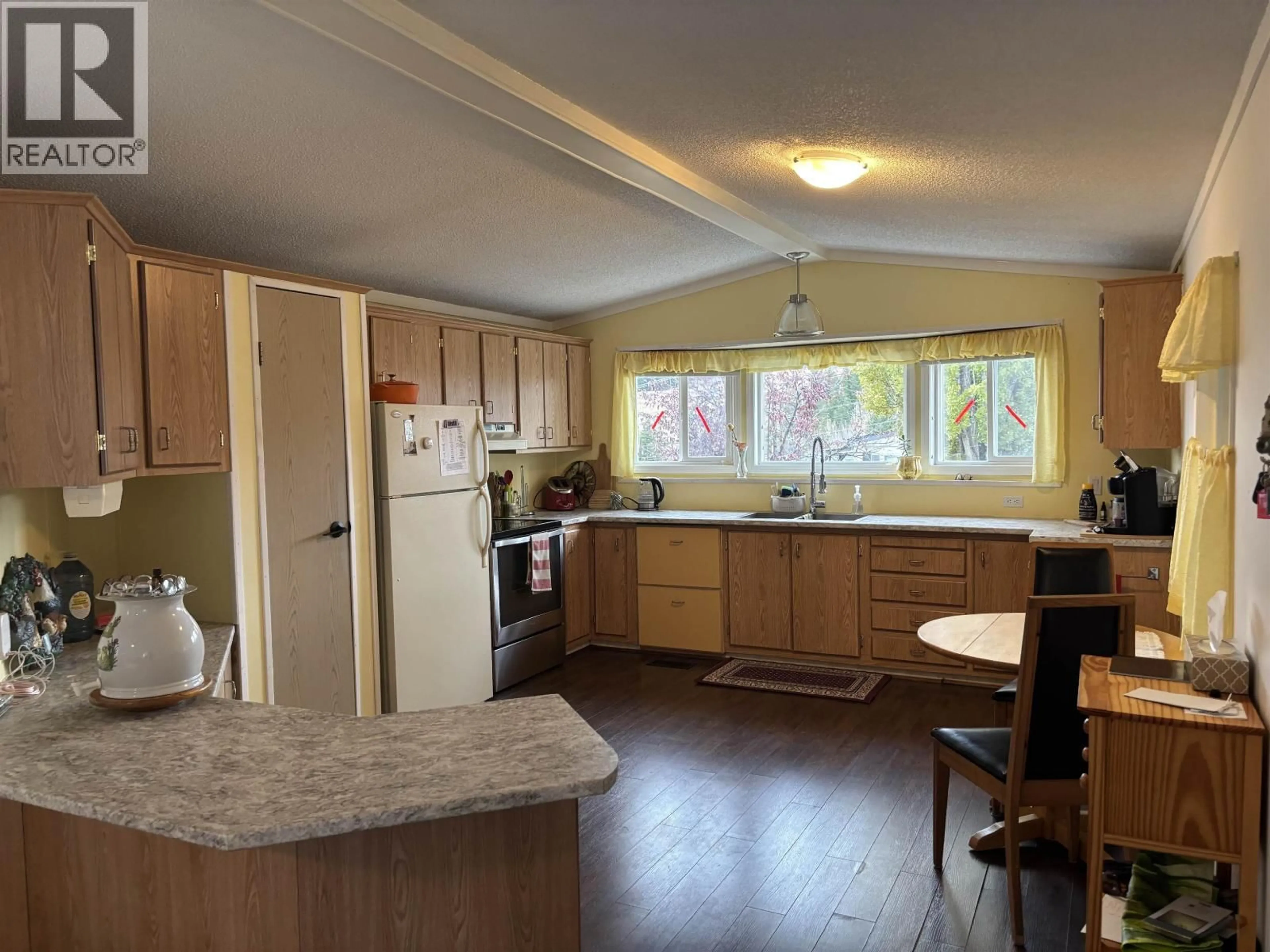 Standard kitchen, wood/laminate floor for 57 - 997 20 HIGHWAY, Williams Lake British Columbia V2G2A5