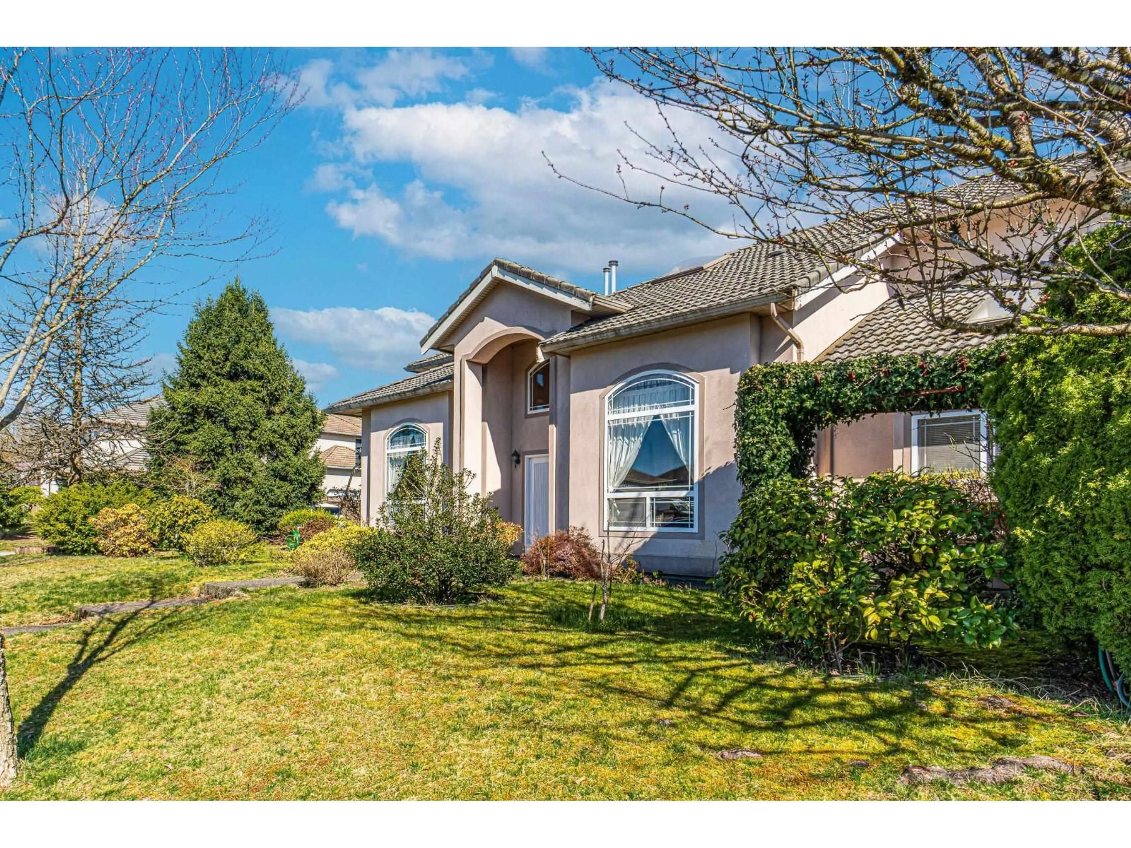 Home with vinyl exterior material, street for 10970 155, Surrey British Columbia V3R0X6