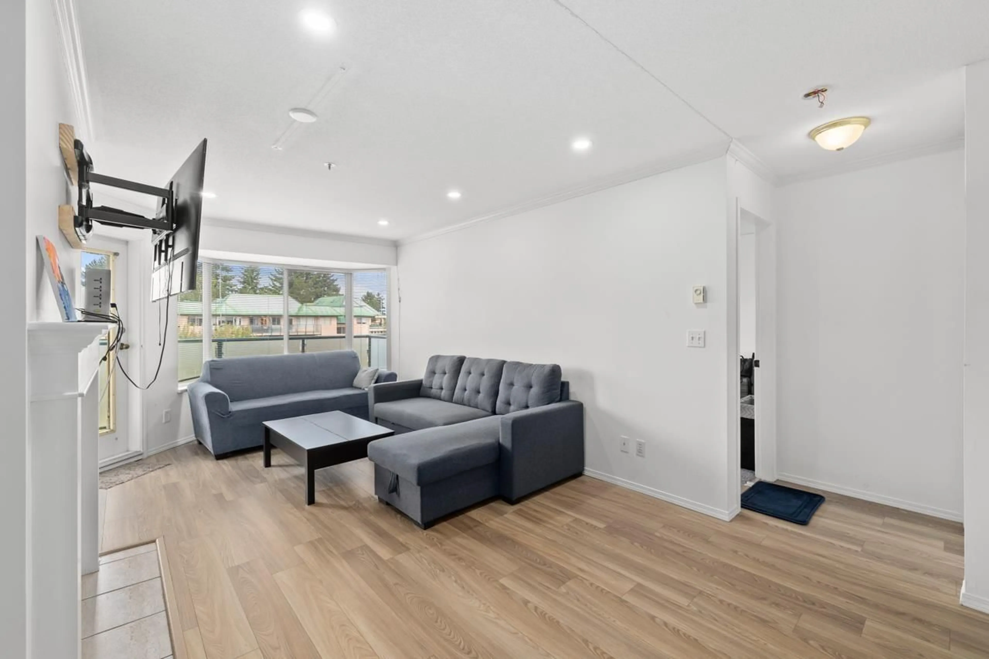 Living room with furniture, unknown for 409 - 2958 TRETHEWEY, Abbotsford British Columbia V2T6P6