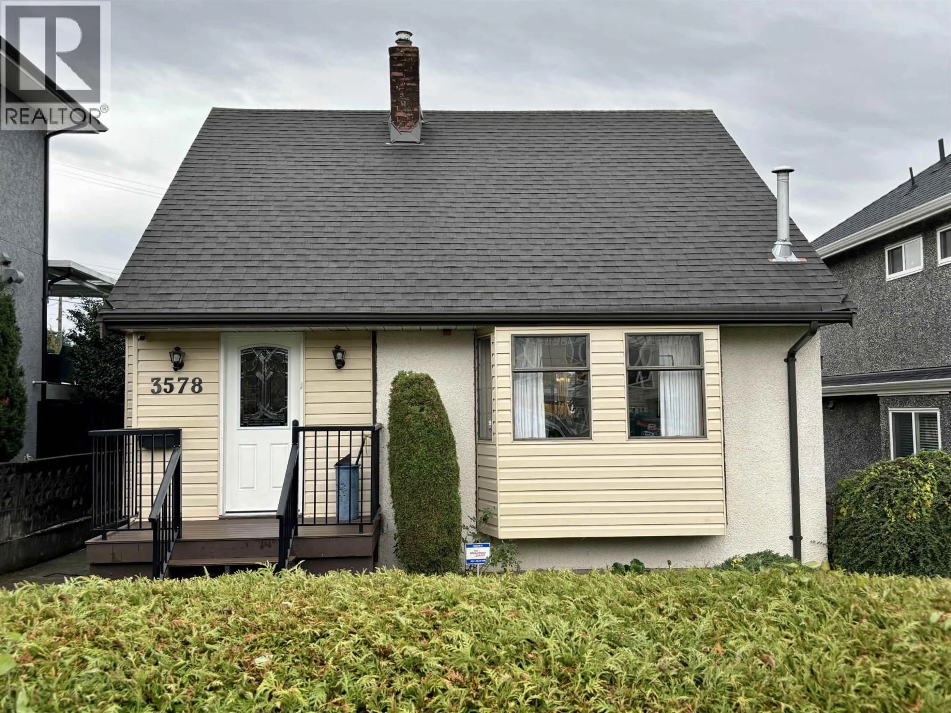 Home with vinyl exterior material, street for 3578 HAIDA DRIVE, Vancouver British Columbia V5M3Z4