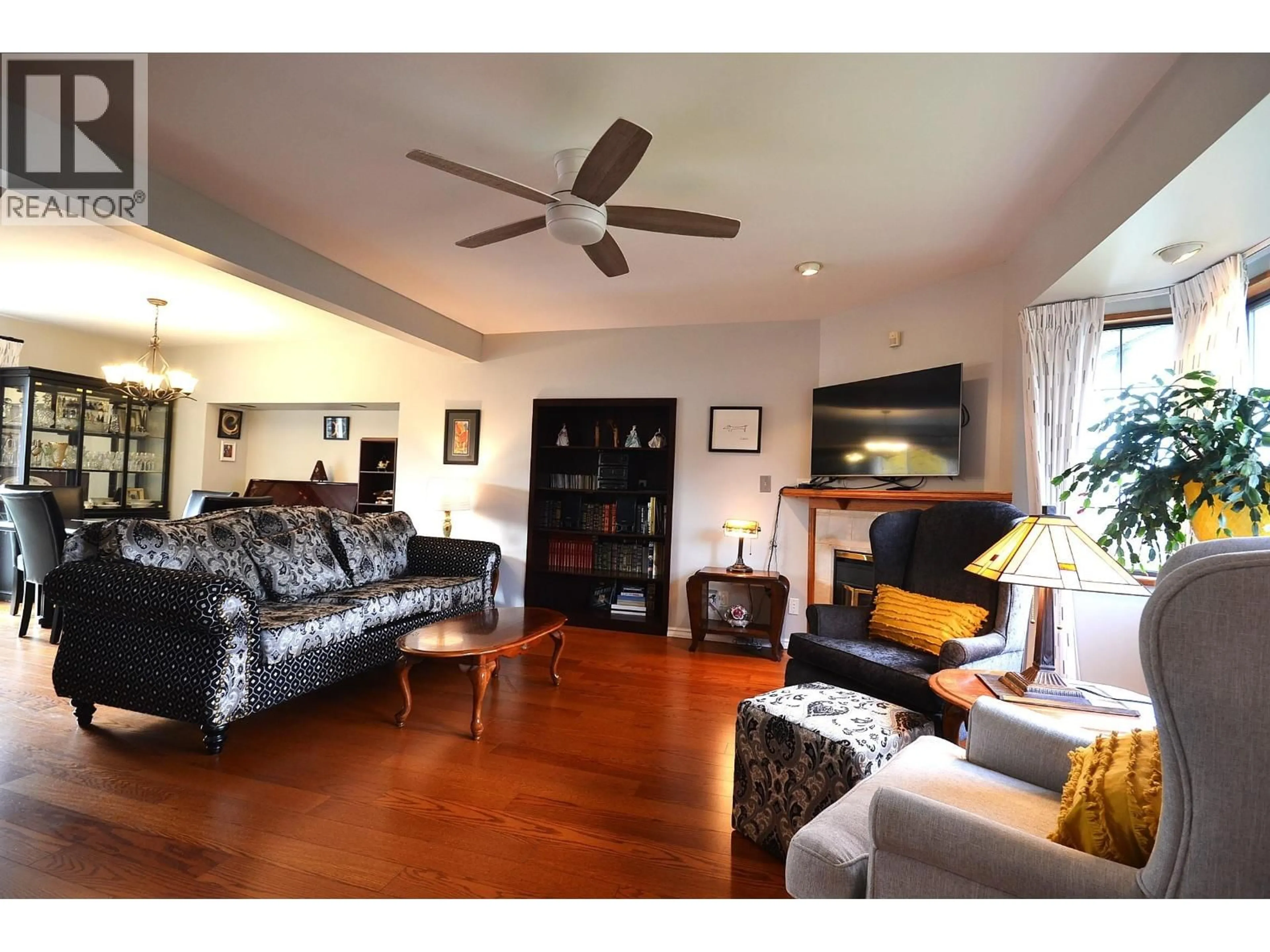 Living room with furniture, wood/laminate floor for 3578 HAIDA DRIVE, Vancouver British Columbia V5M3Z4